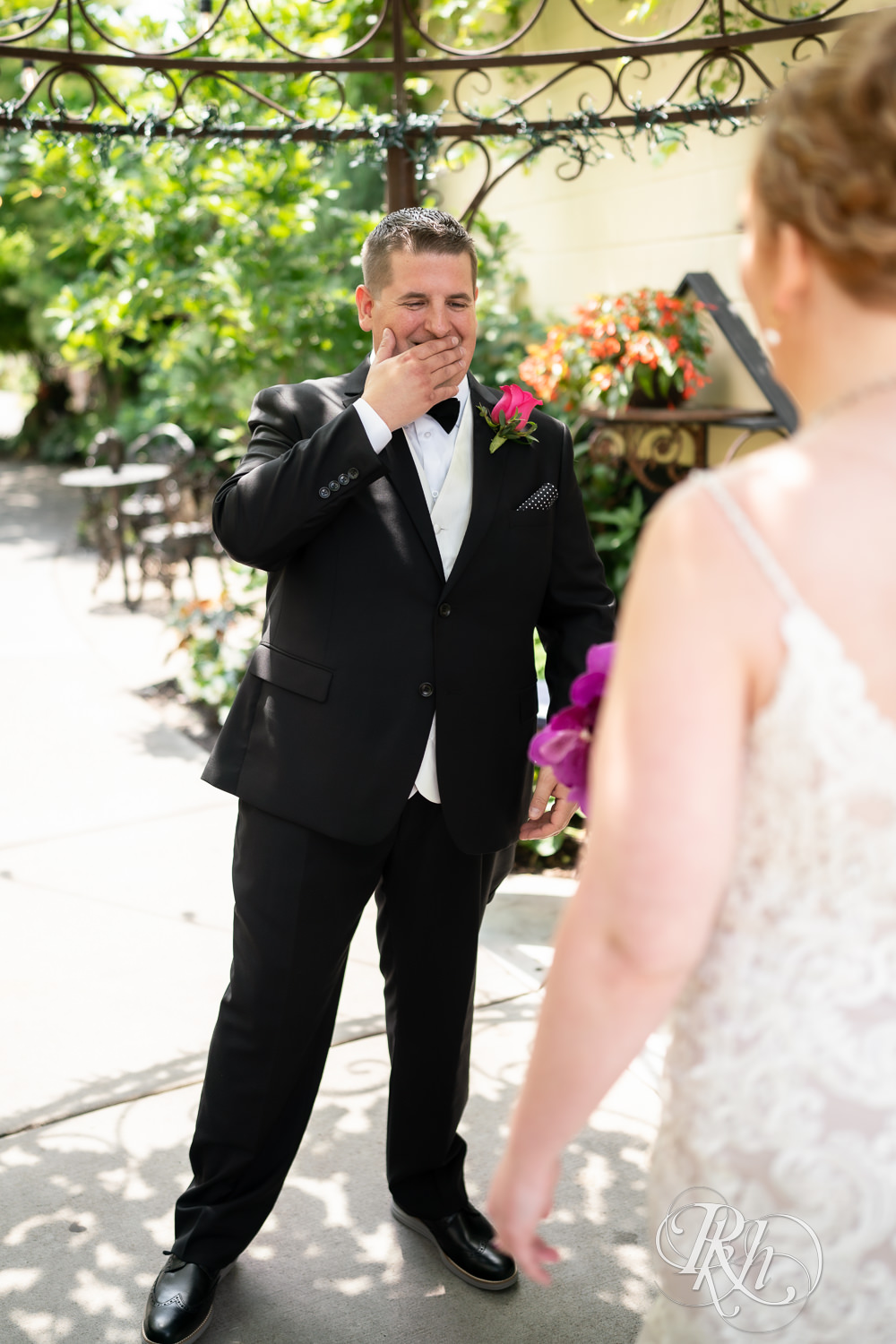 First look during June wedding at Kellerman's Event Center in White Bear Lake, Minnesota.