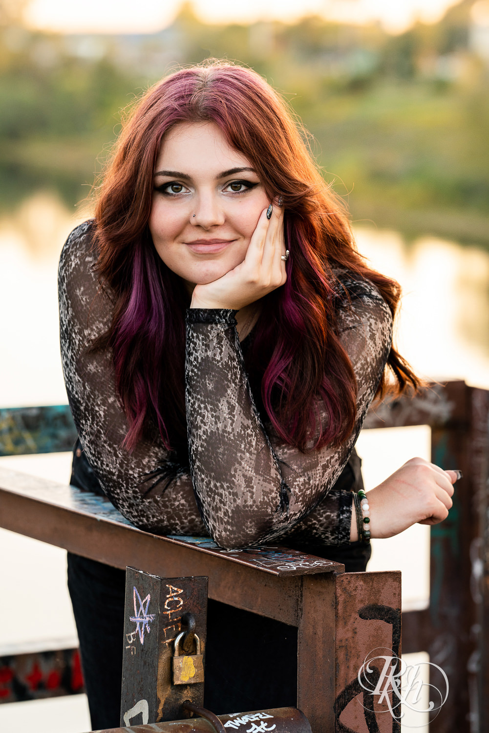 Senior girl with purple hair and chin in hand for her Northeast Minneapolis senior photography
