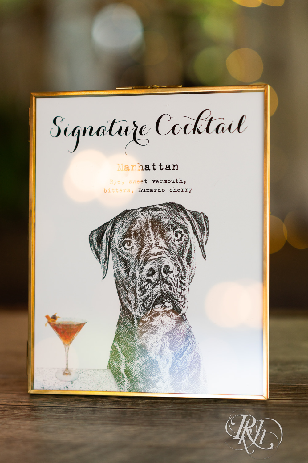 Signature cocktail sign with puppy at Camrose Hill in Stillwater, Minnesota