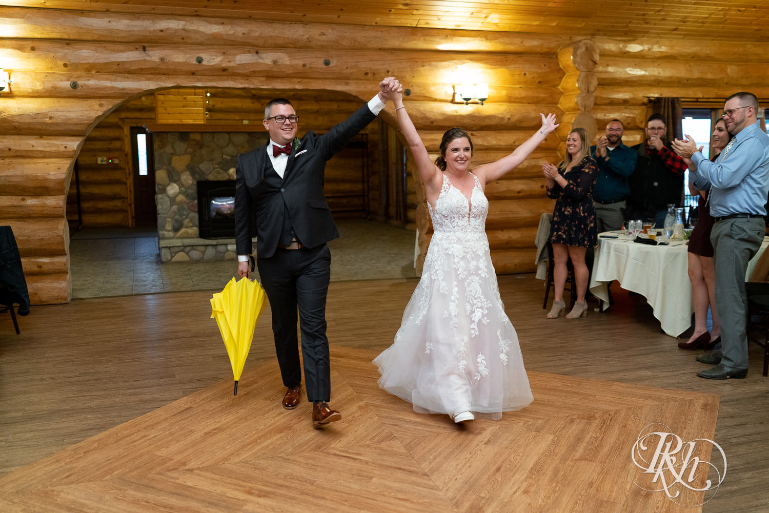 Bride and groom grand entrance at Glenhaven Events in Farmington, Minnesota.