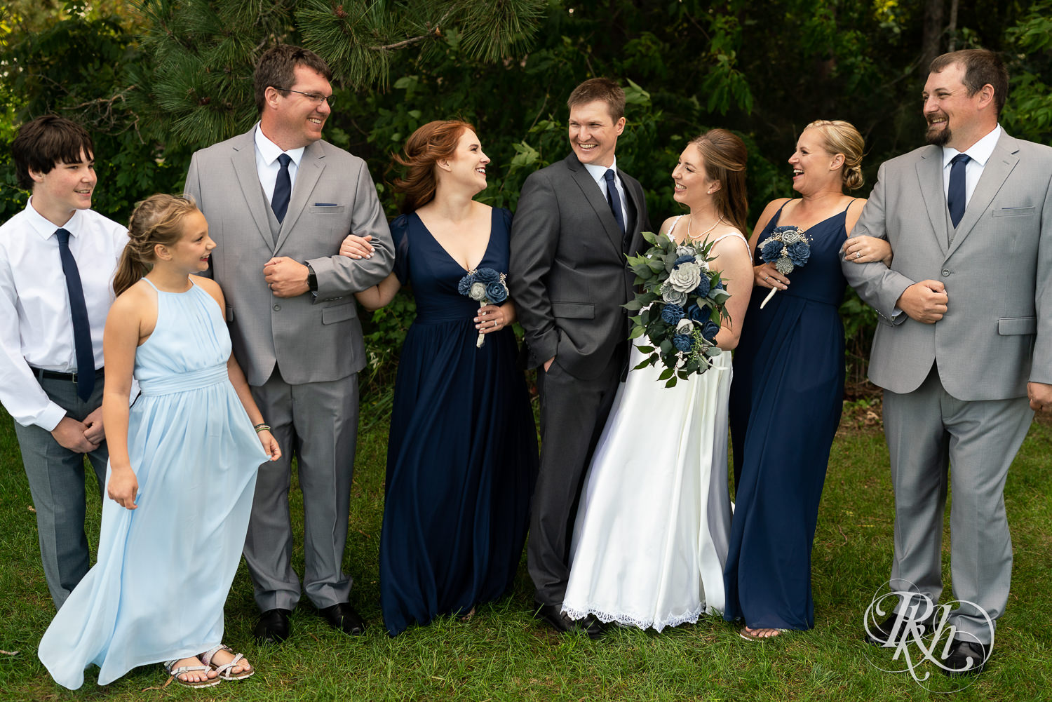 Wedding party at a summer wedding at Stone Lion Winery and Events in Isanti, Minnesota. 