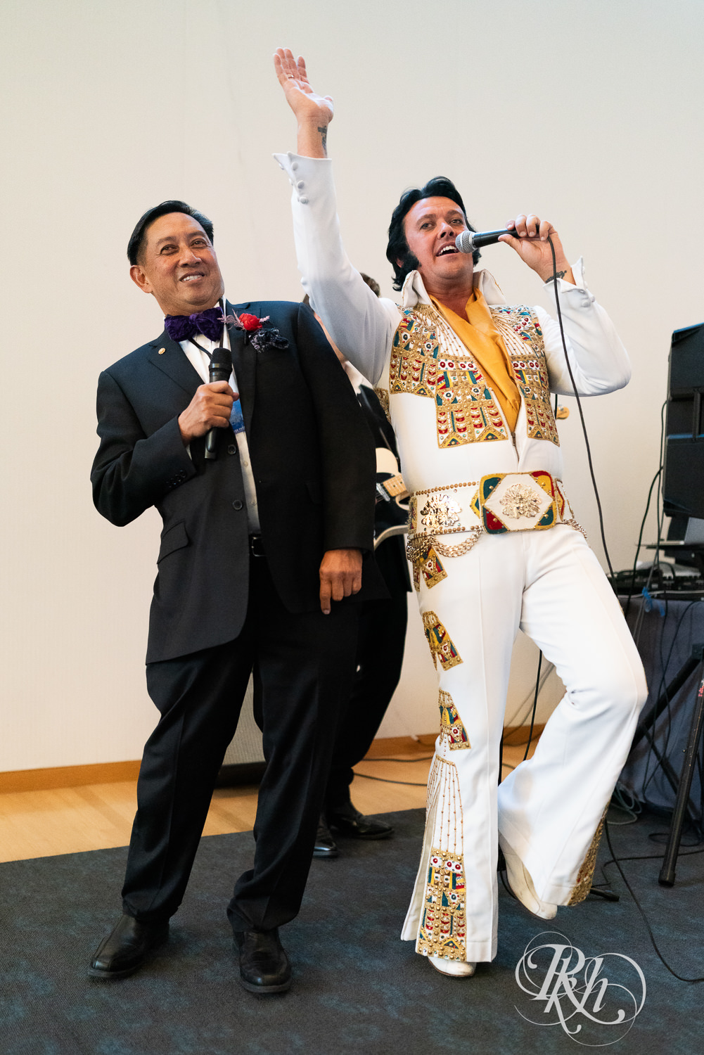 Elvis impersonator sings during wedding reception at the American Swedish Institute in Minneapolis, Minnesota.
