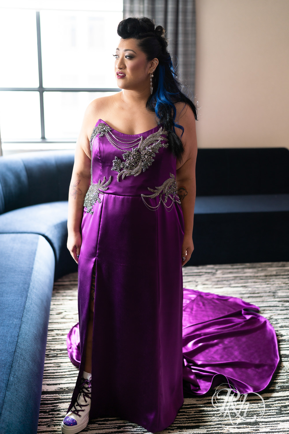 Filipino bride with mowhawk dressed in purple wedding dress on wedding day.