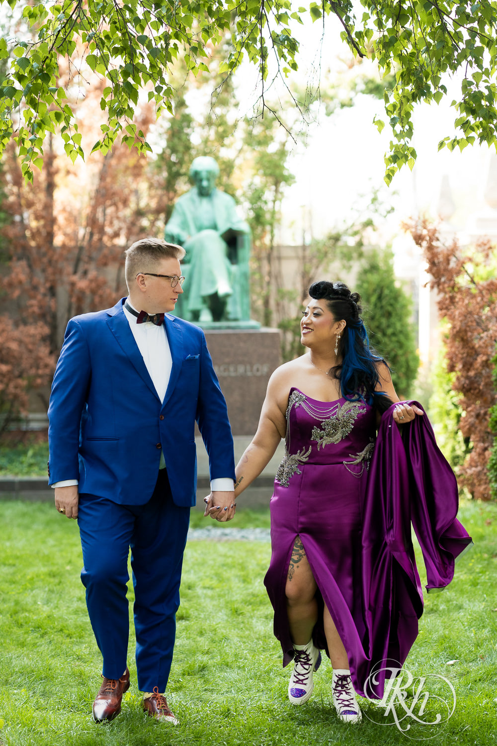 Filipino bride with mohawk dressed in purple wedding dress and groom smile at American Swedish Institute in Minnesota.