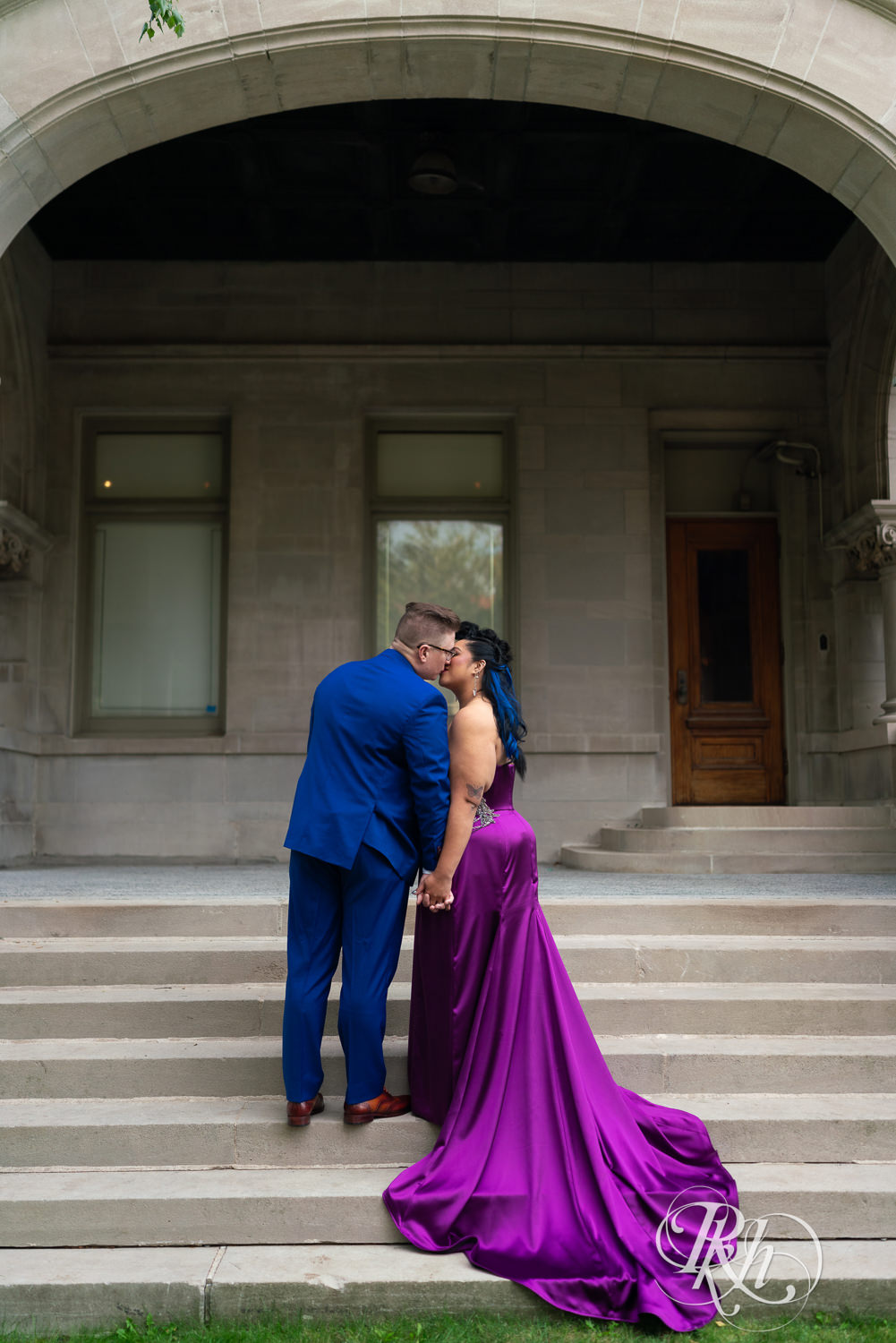 Filipino bride with mohawk dressed in purple wedding dress and groom kiss at American Swedish Institute in Minnesota.