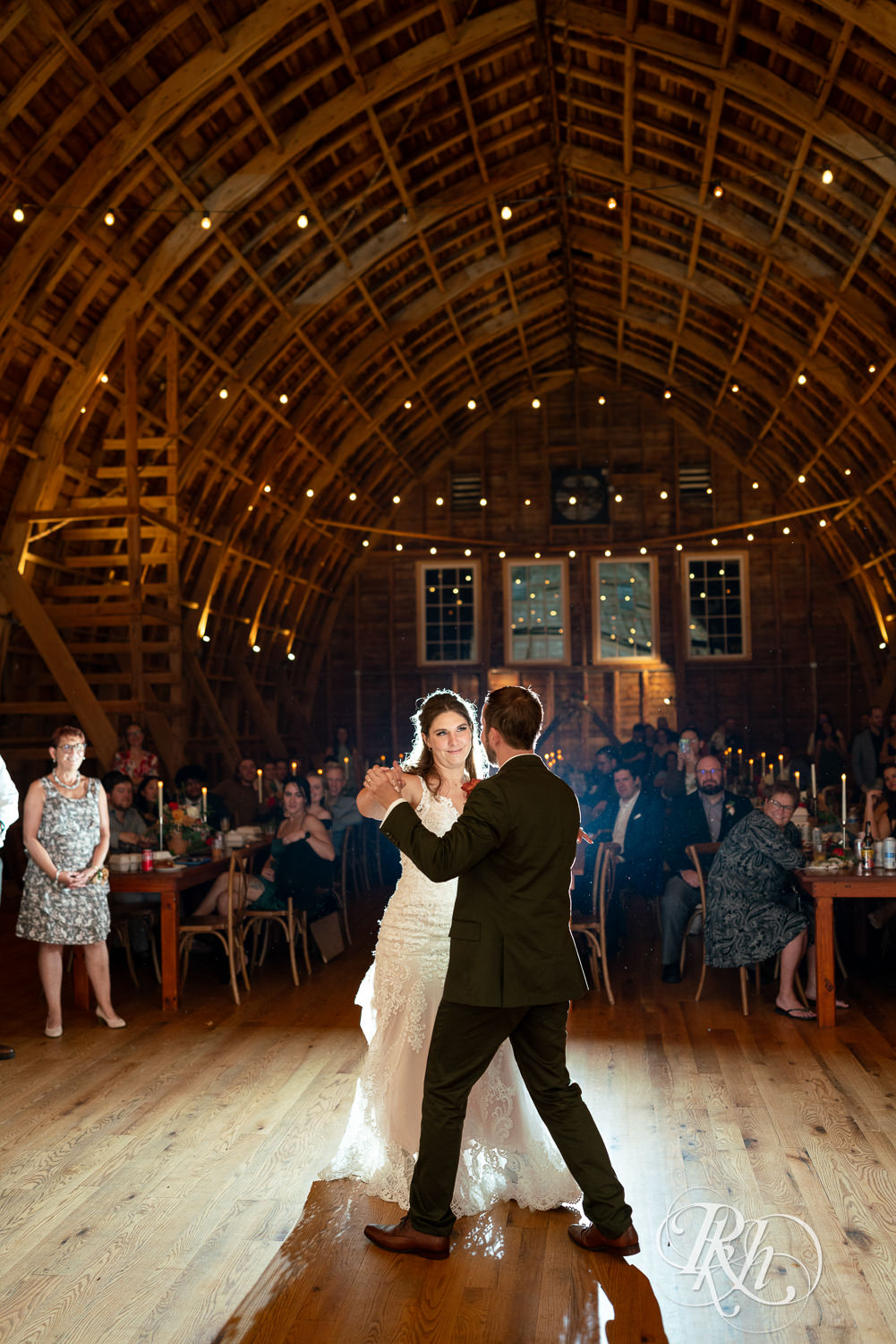 Bride and groom share first dance at Hayvn at Hay River in Boyceville, Wisconsin. 
