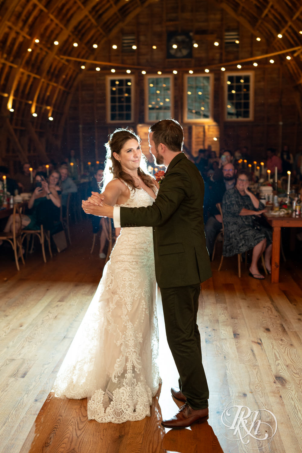 Bride and groom share first dance at Hayvn at Hay River in Boyceville, Wisconsin. 