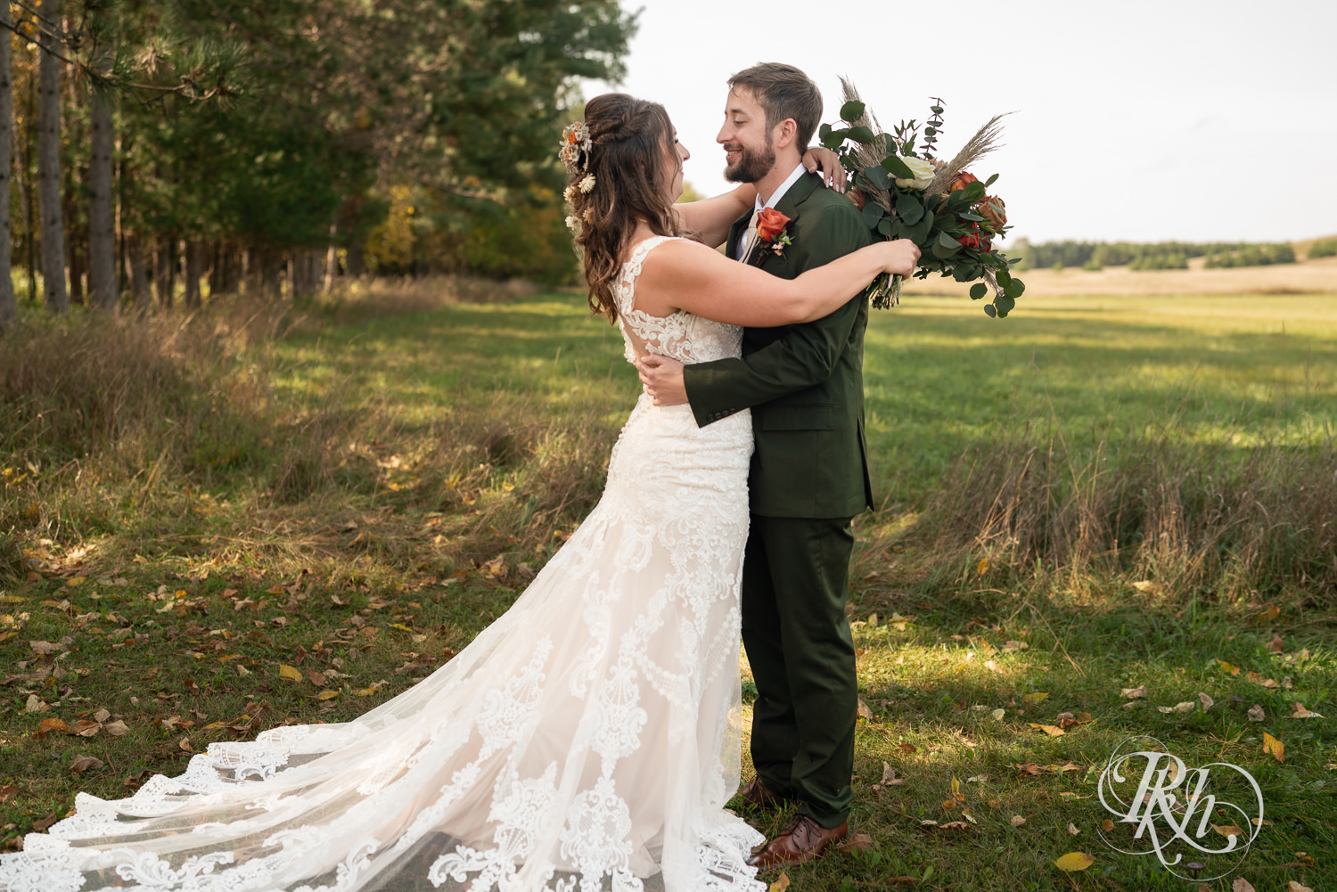 Bride and groom sharing first look at Hayvn at Hay River in Boyceville, Wisconsin. 