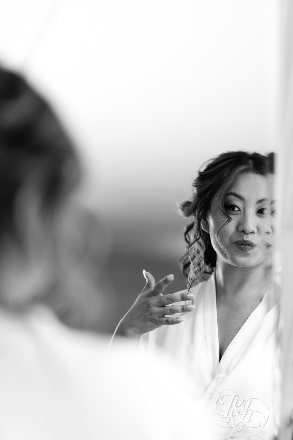Hmong bride gets ready for wedding at the Saint Paul Athletic Club in Saint Paul, Minnesota.