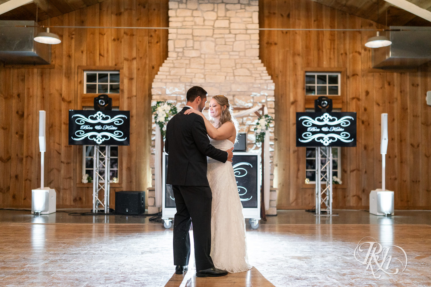 Bride and groom share first dance at wedding reception at Almquist Farm in Hastings, Minnesota.