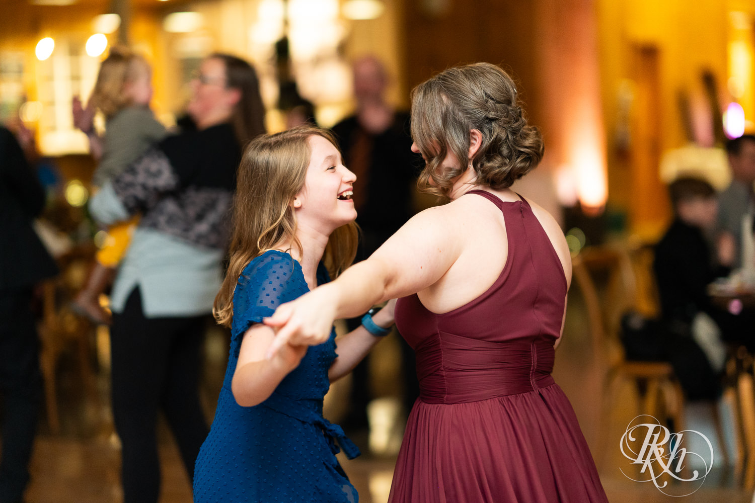 Guests dance at wedding reception at Almquist Farm in Hastings, Minnesota.