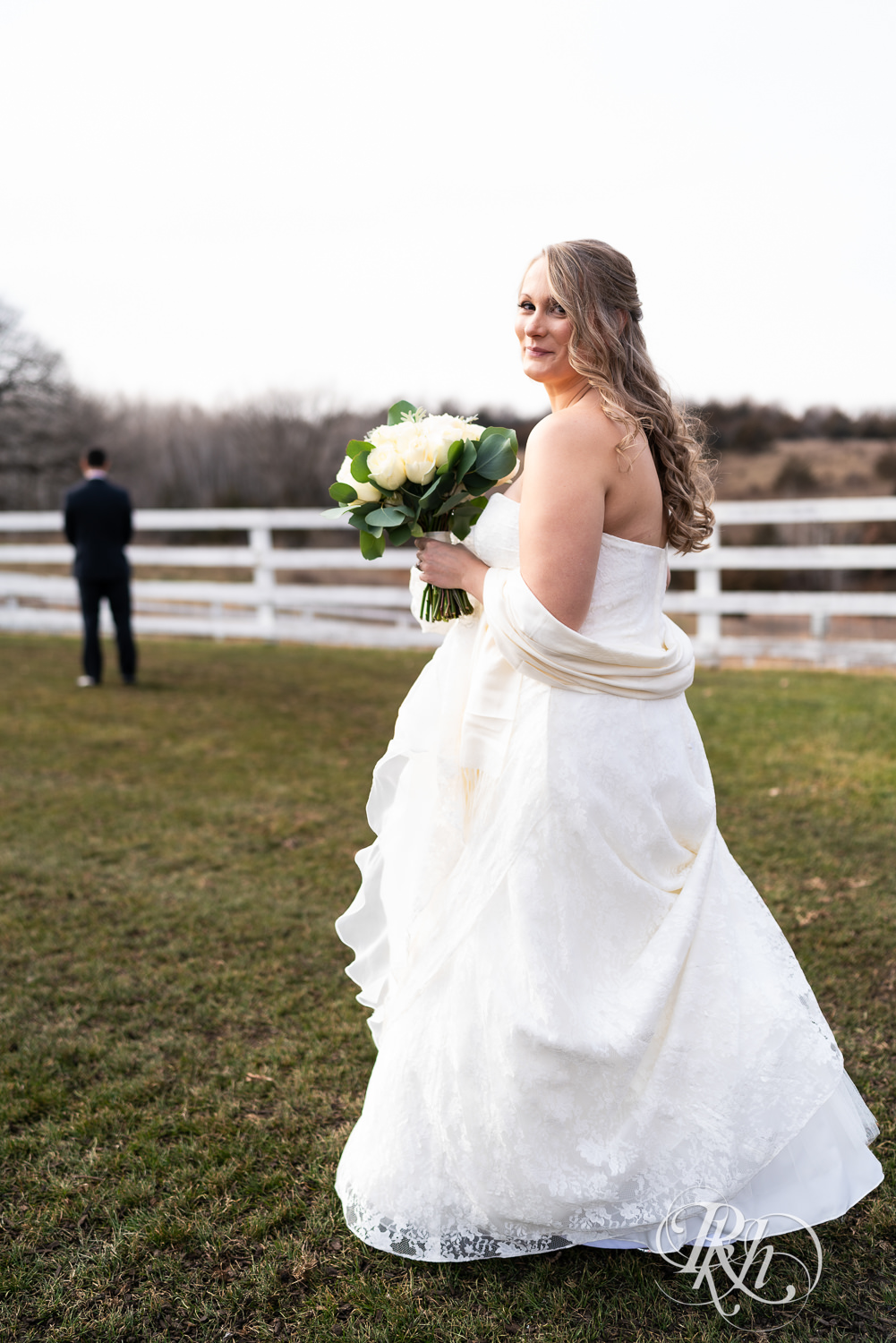 Bride and groom share first look on wedding day at Almquist Farm in Hastings, Minnesota.