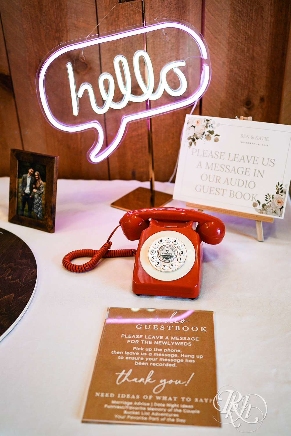 Table with guest table numbers and a red phone at Almquist Farm in Hastings, Minnesota.