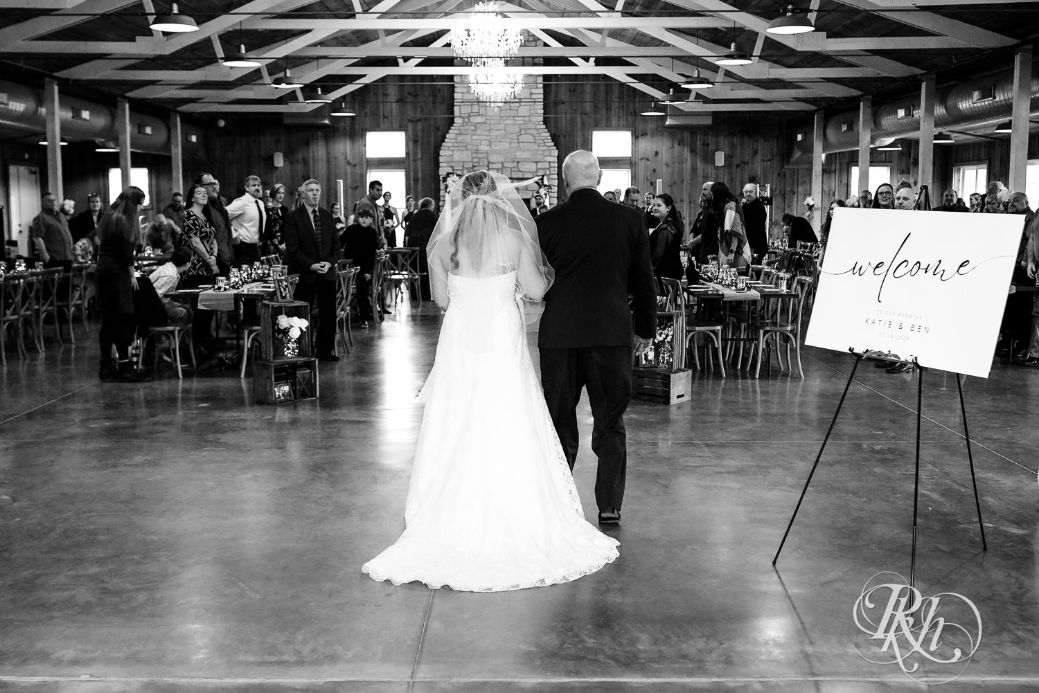 Bride walks down the aisle at Almquist Farm in Hastings, Minnesota.