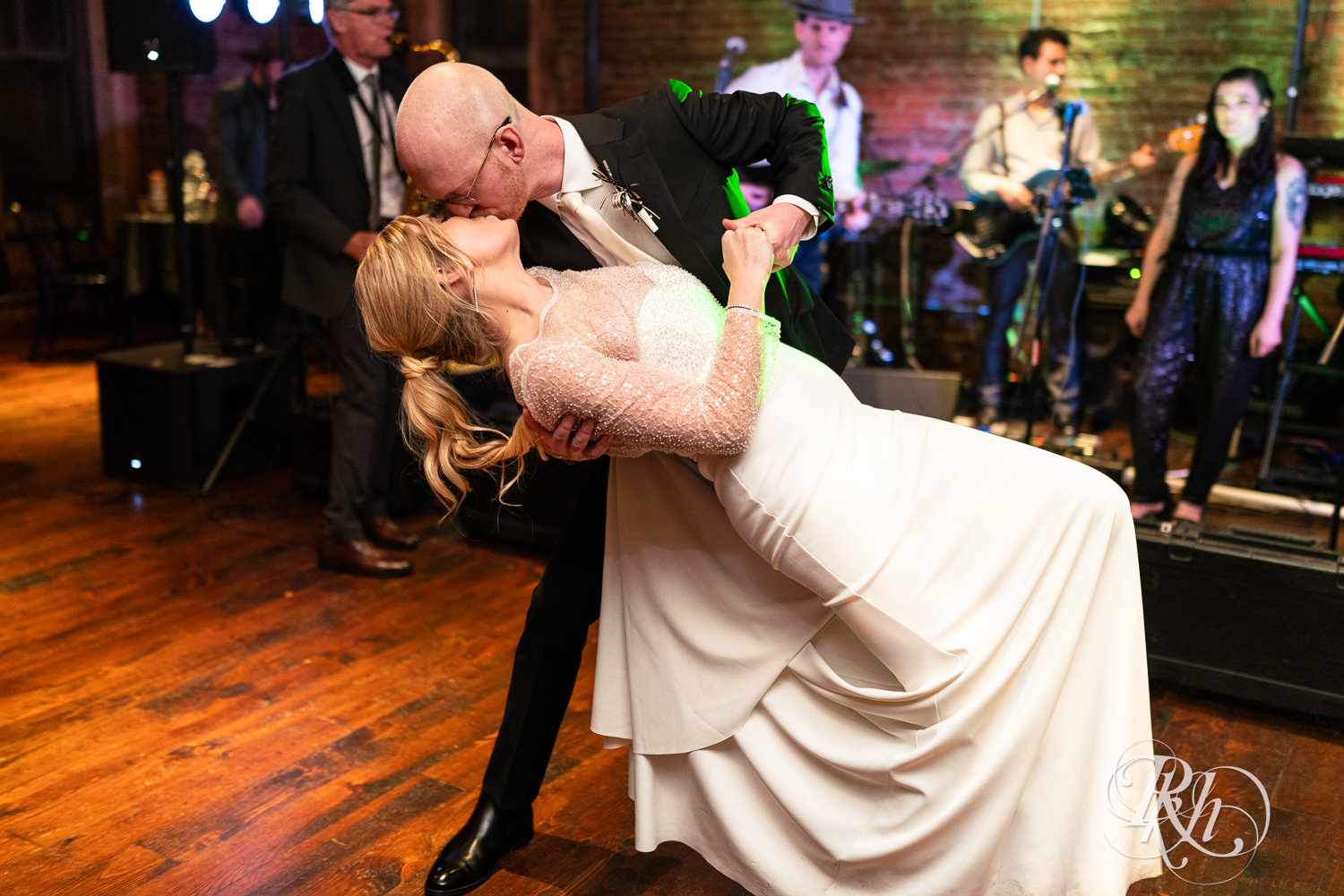 Bride and groom have first dance during wedding reception at Gatherings at Station 10 in Saint Paul, Minnesota.
