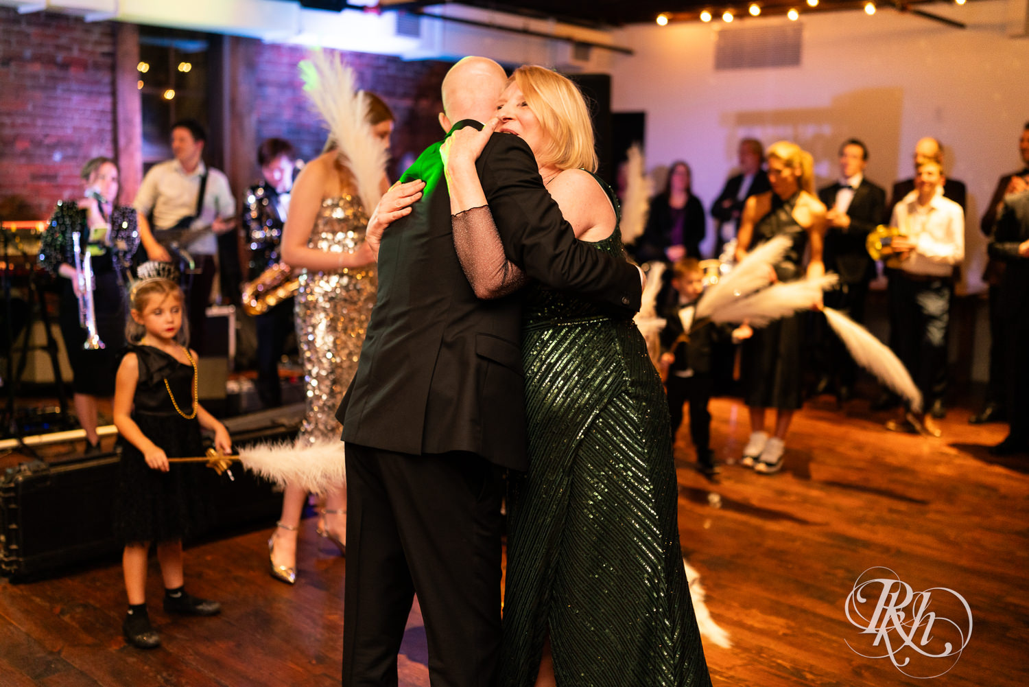 Groom and mom dance during wedding reception at Gatherings at Station 10 in Saint Paul, Minnesota.