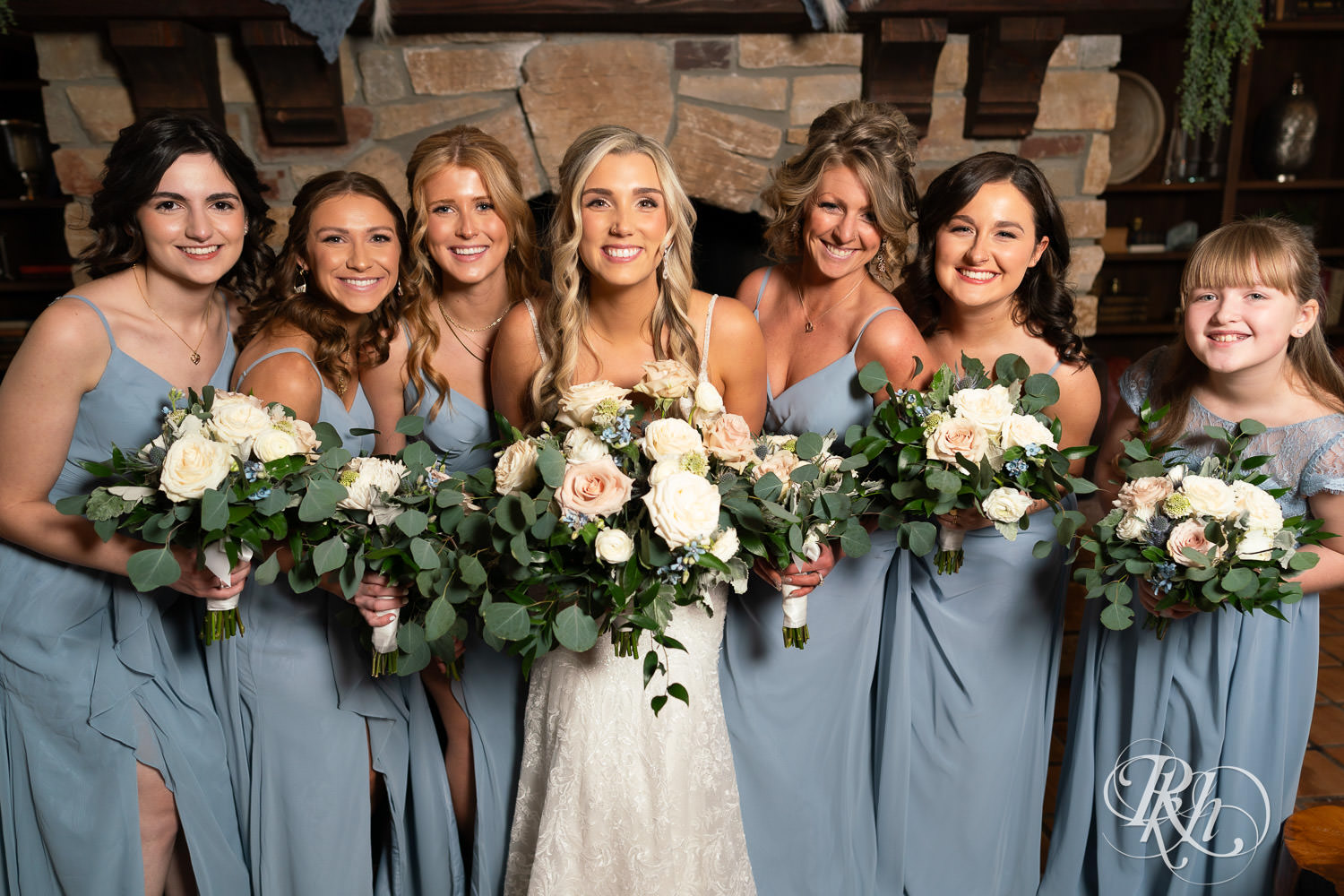 Wedding party smiles with the bride during wedding photography at Bavaria Downs in Chaska, Minnesota.