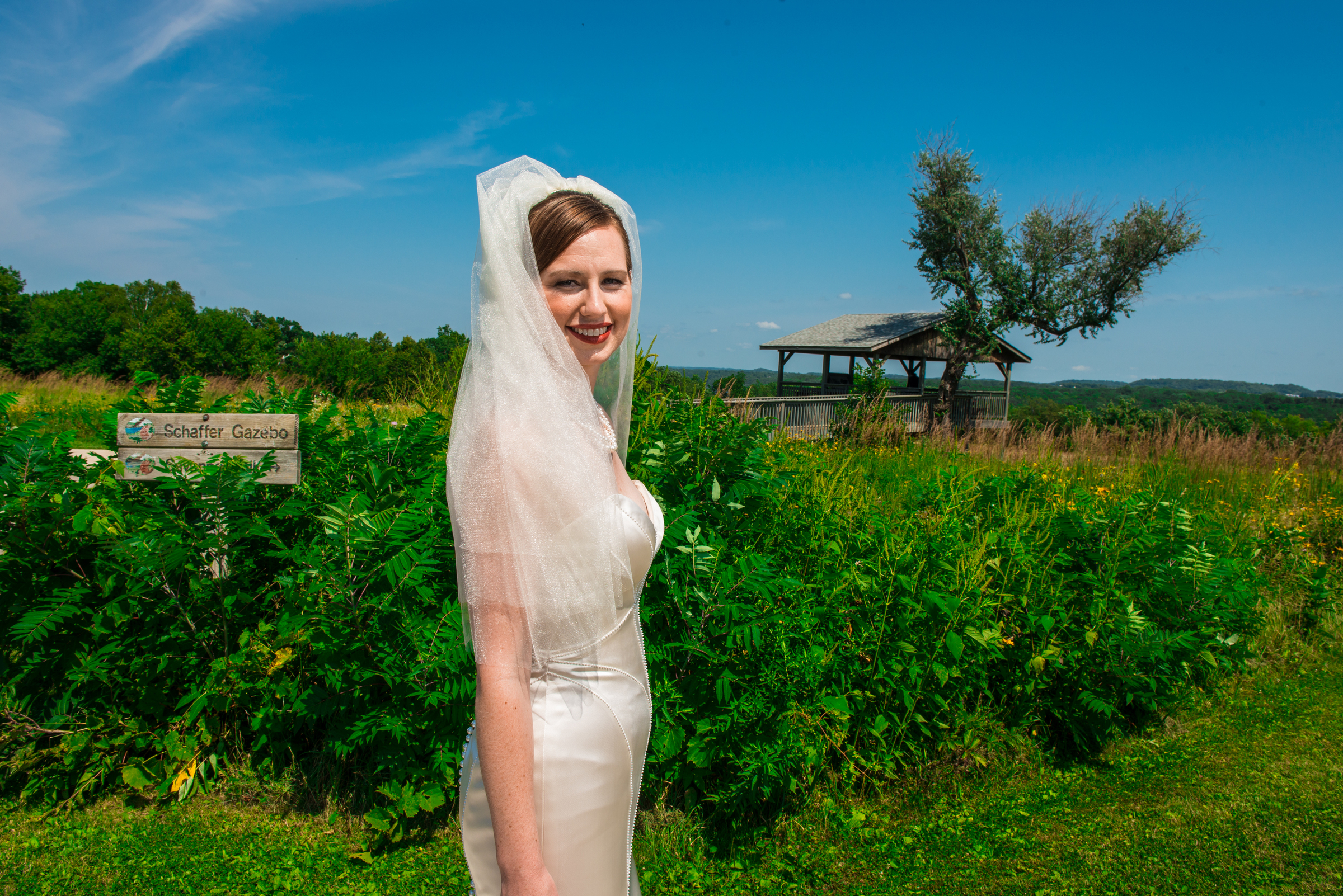 Bride and groom share first look at Carpenter Nature Center in Hastings, Minnesota.