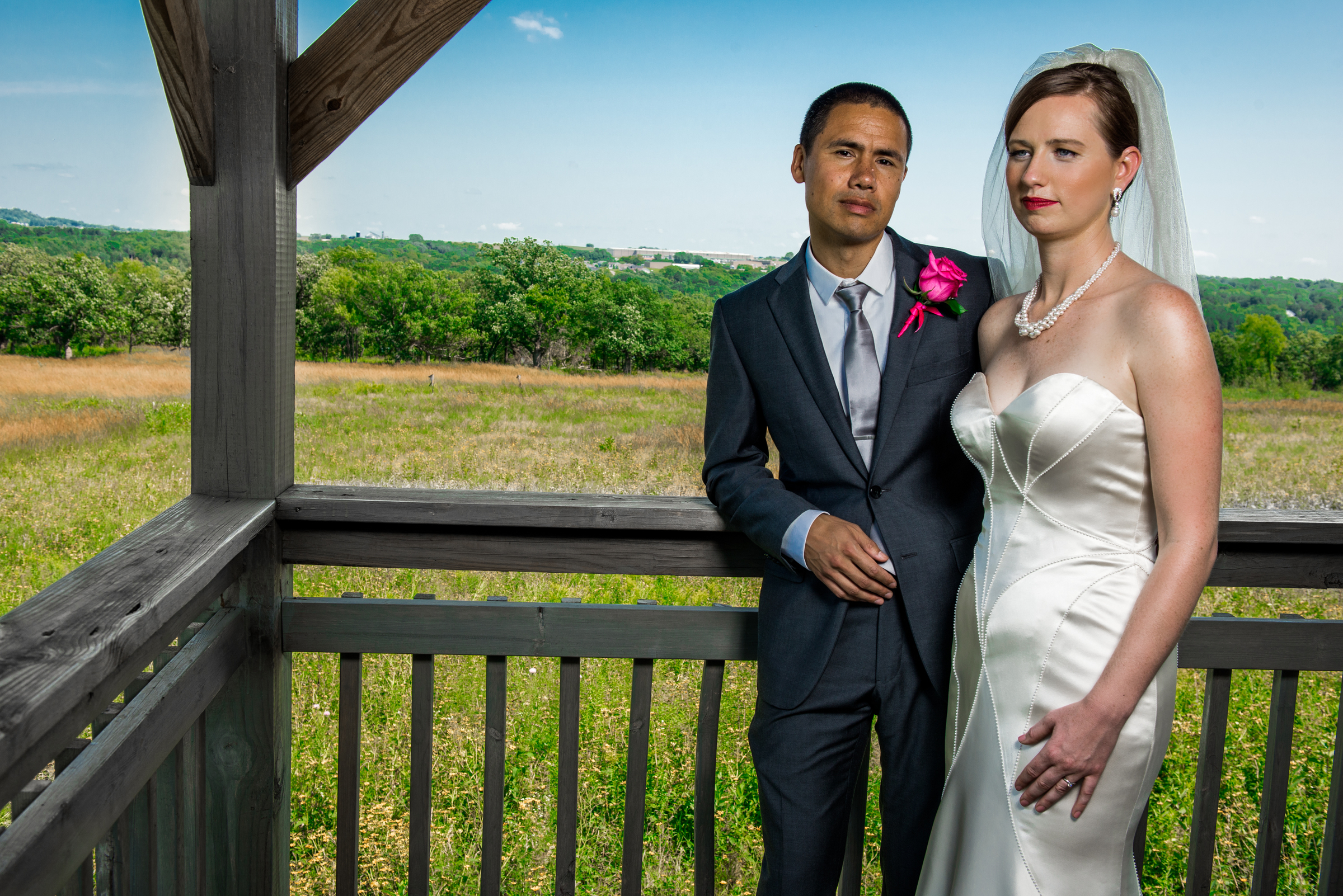 Bride and groom pose dramatically at Carpenter Nature Center in Hastings, Minnesota.