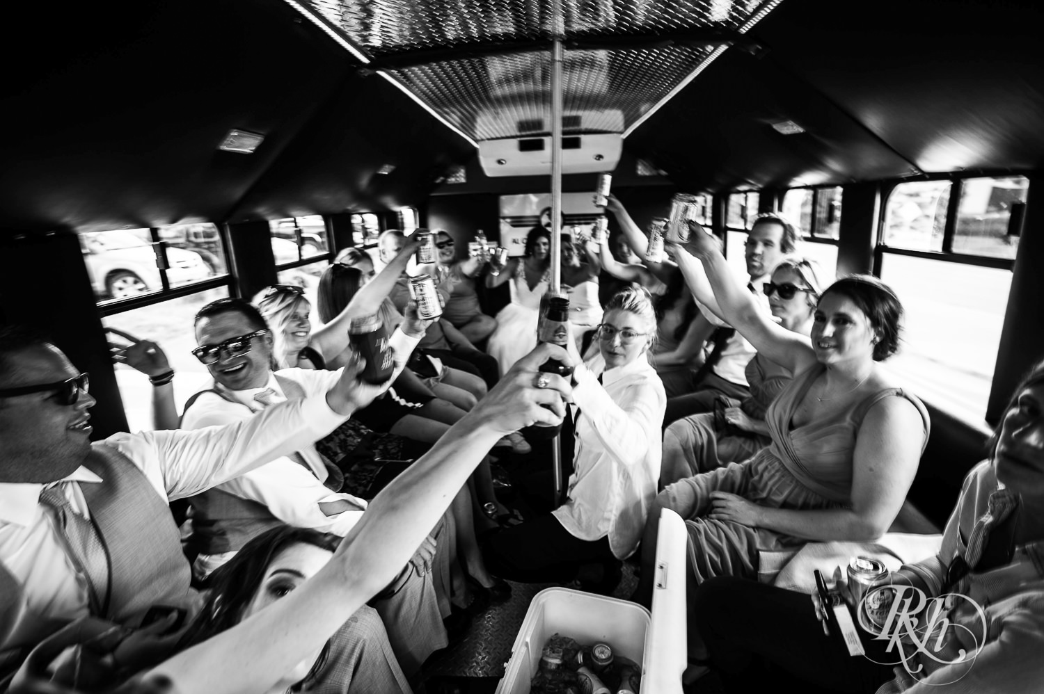 Wedding party drinks on a party bus in Duluth, Minnesota.