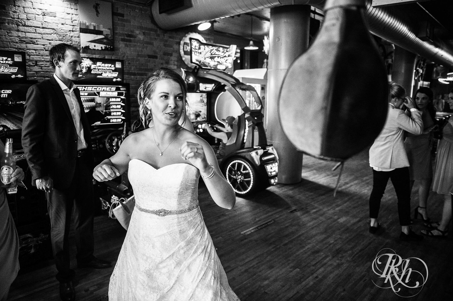 Bride punches a punching bag