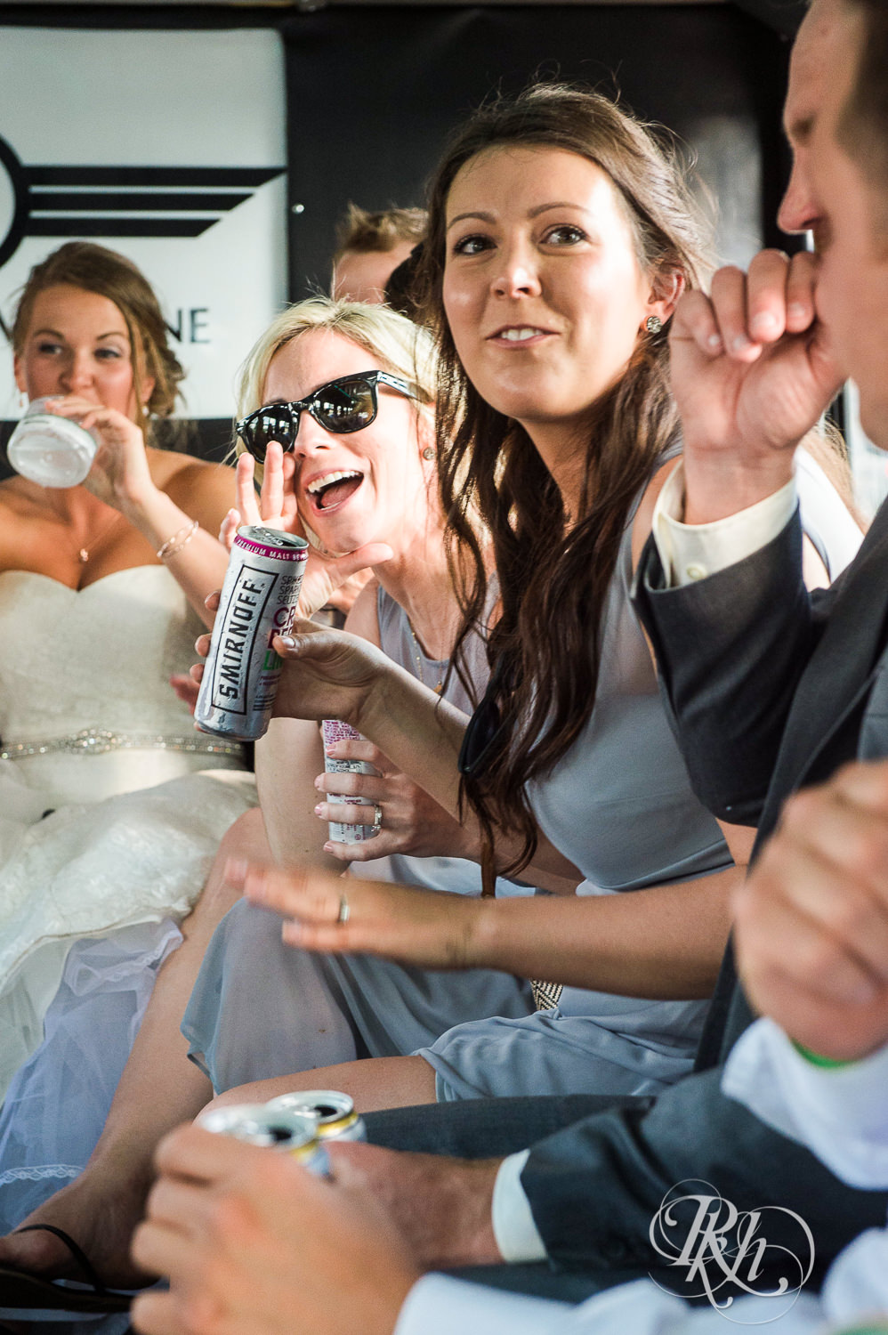 Lesbian brides drink on a party bus in Duluth, Minnesota.