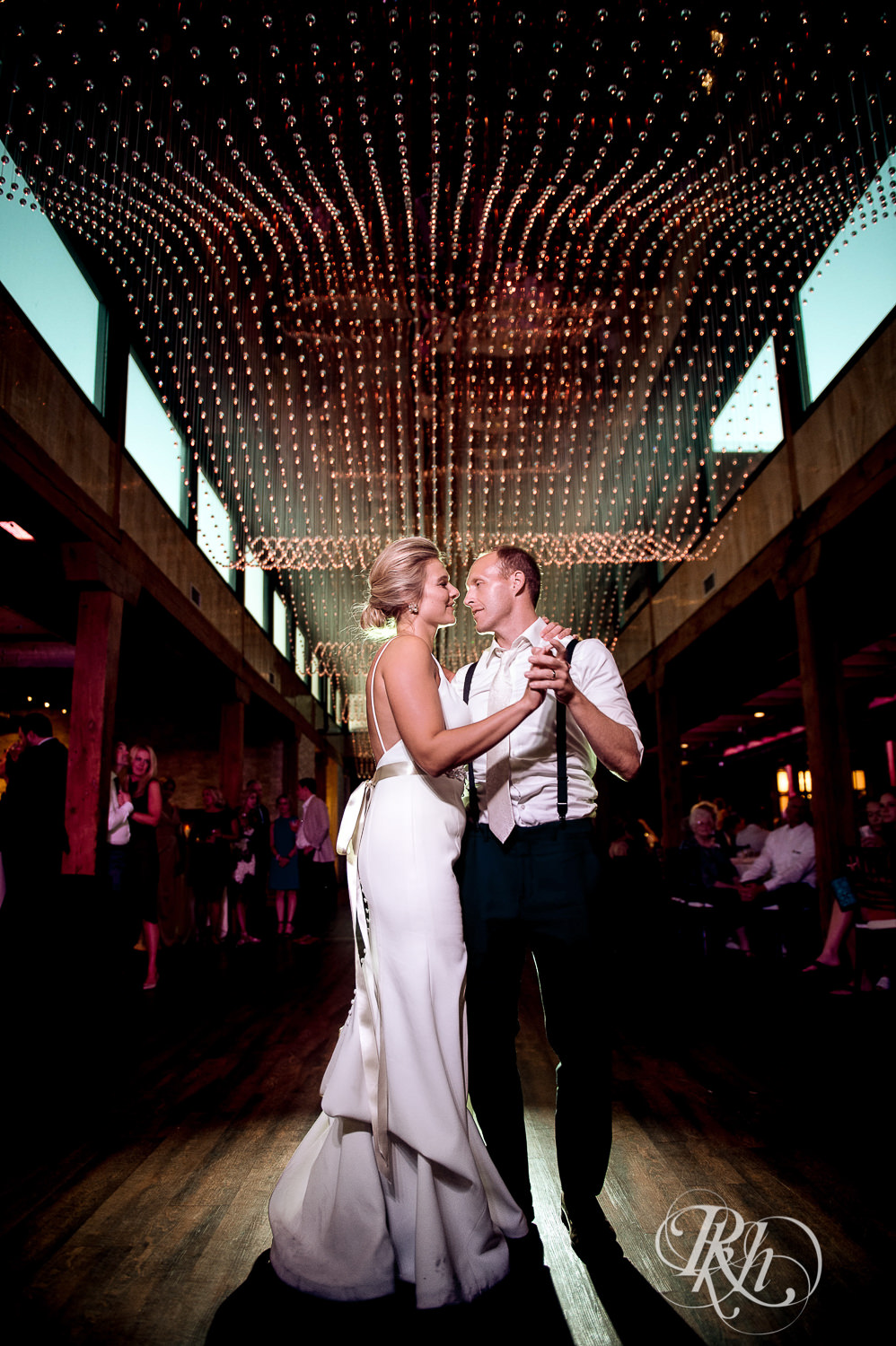 Bride and groom dance during wedding reception at Minneapolis Event Centers in Minneapolis, Minnesota.