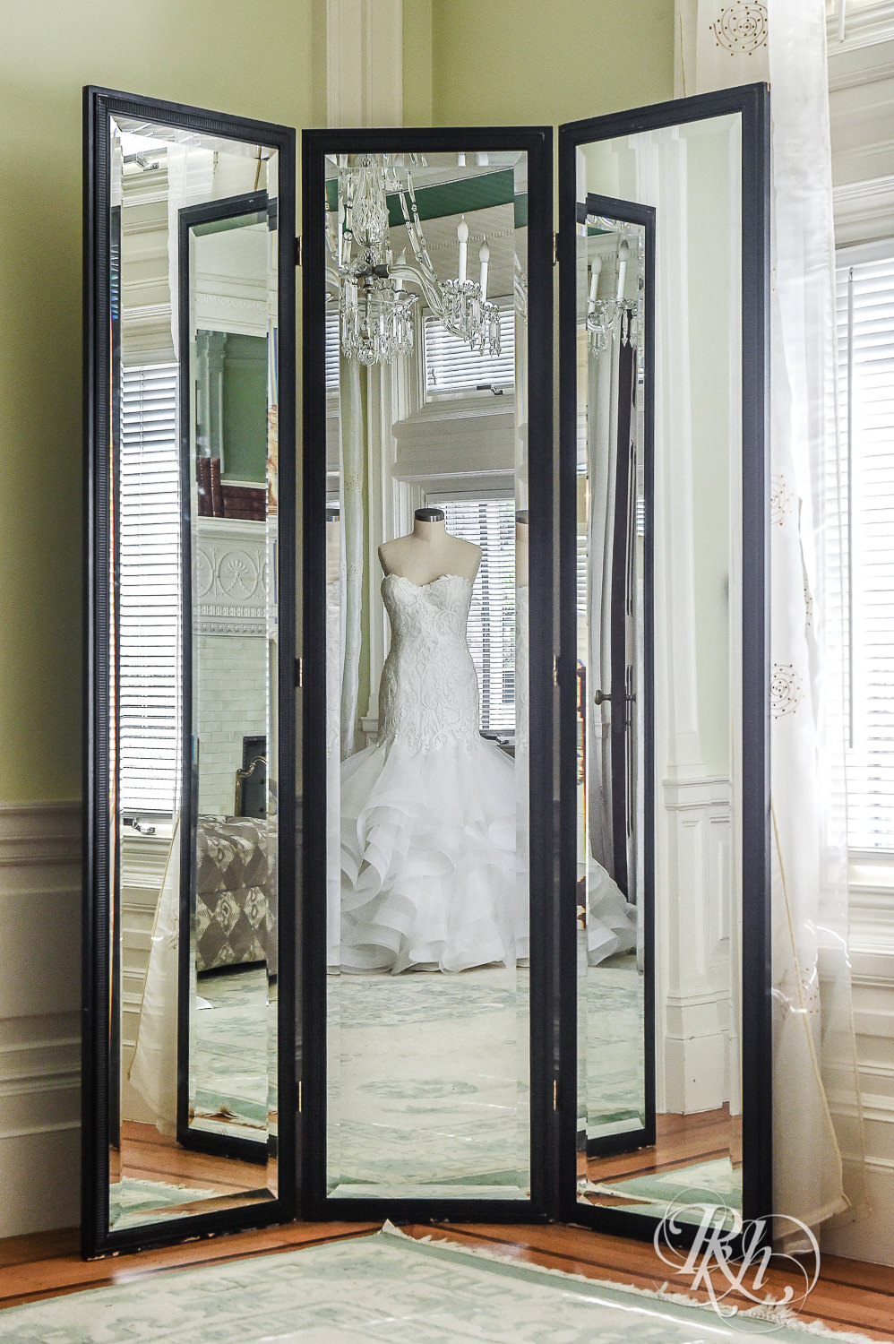 Wedding dress in the mirror at the Van Dusen Mansion in Minneapolis, Minnesota.