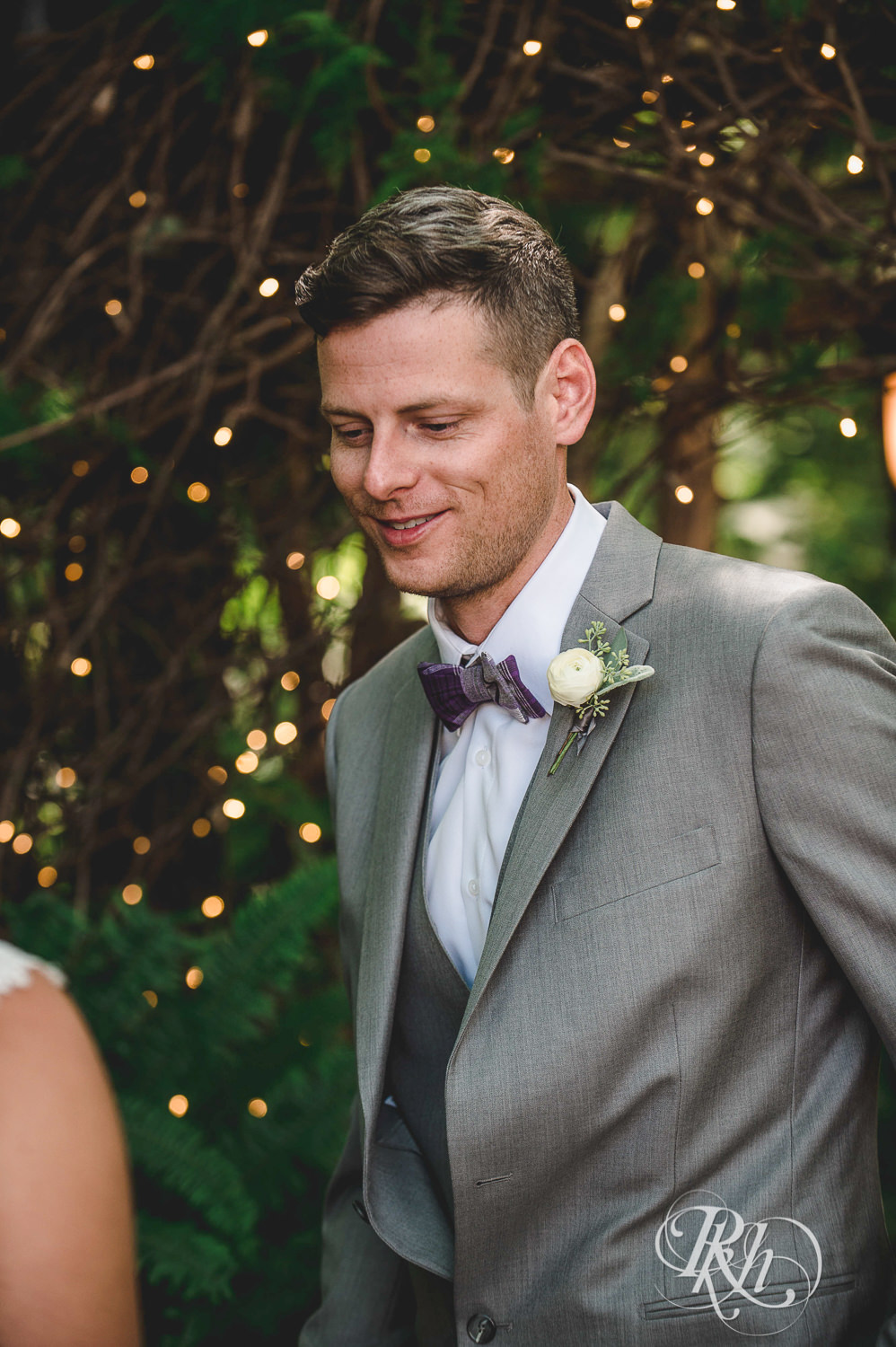 Bride and groom do their first look at Camrose Hill Flower Farm in Stillwater, Minnesota.