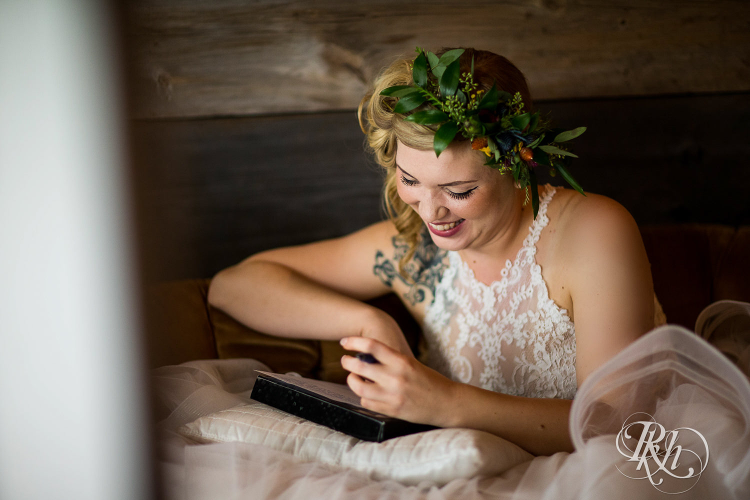 Bride writes vows before wedding at Coops Event Barn in Dodge Center, Minnesota.