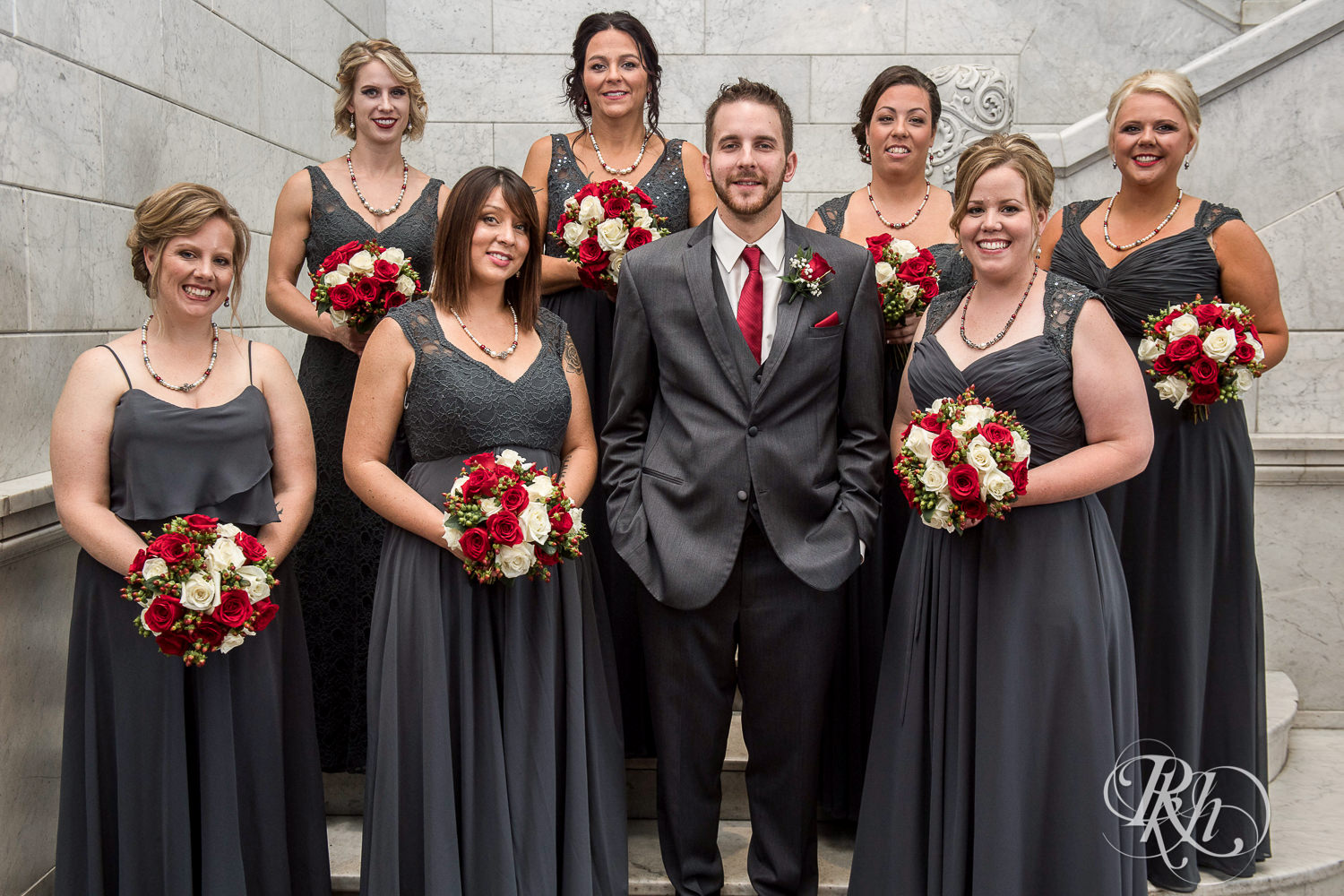 Wedding party smiles on wedding day at Lumber Exchange Event Center in Minneapolis, Minnesota.
