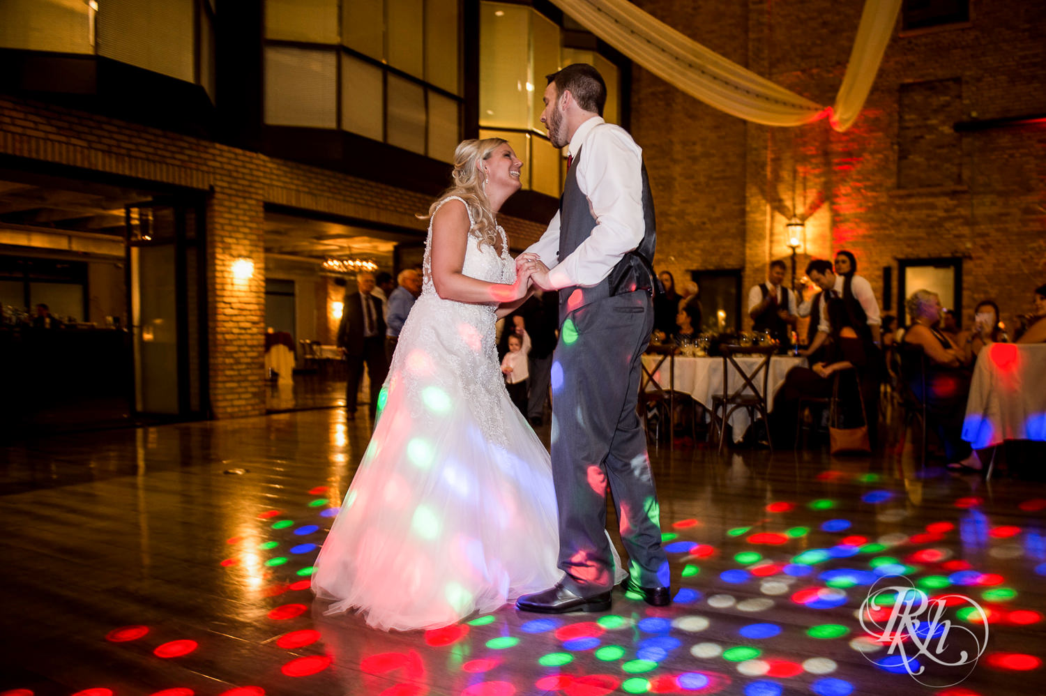Bride and groom dance at wedding reception at the Lumber Exchange Event Center in Minneapolis, Minnesota.