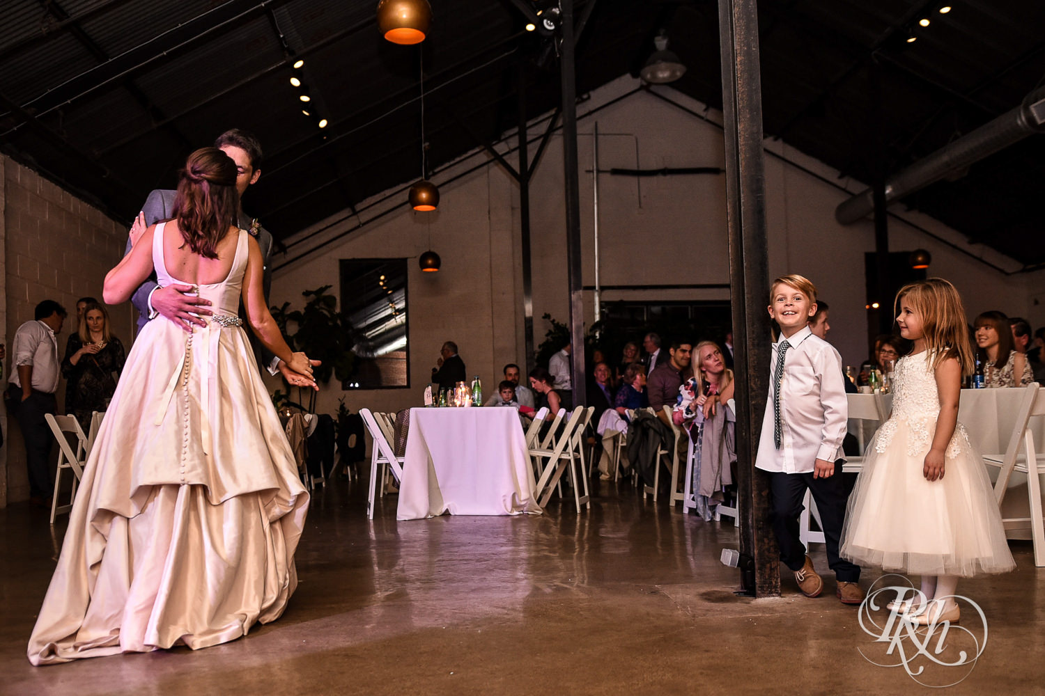 Bride and groom dance during wedding reception speeches at Paikka in Saint Paul, Minnesota.