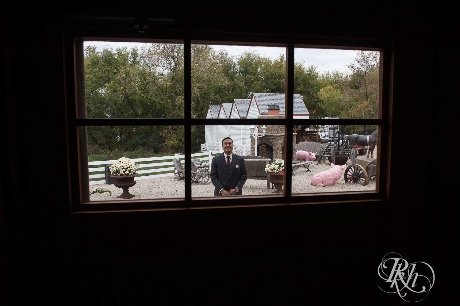 Groom waits for first look at barn wedding at Green Acres Event Center in Eden Prairie, Minnesota.