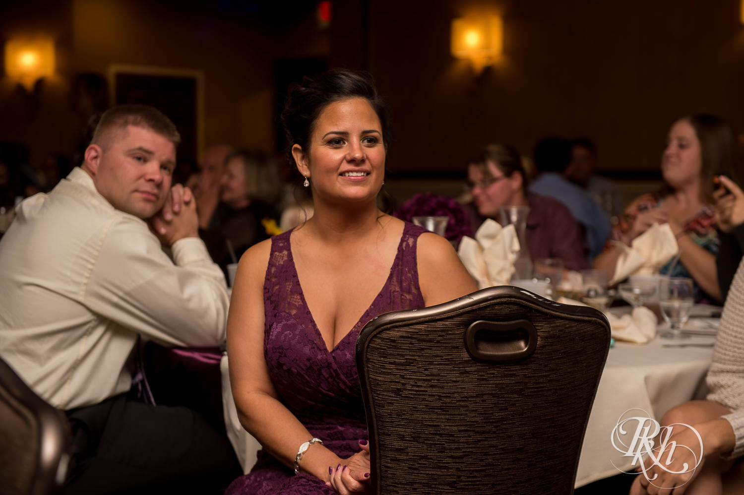 Guests smile during wedding reception at White Bear Country Inn in White Bear Lake, Minnesota.