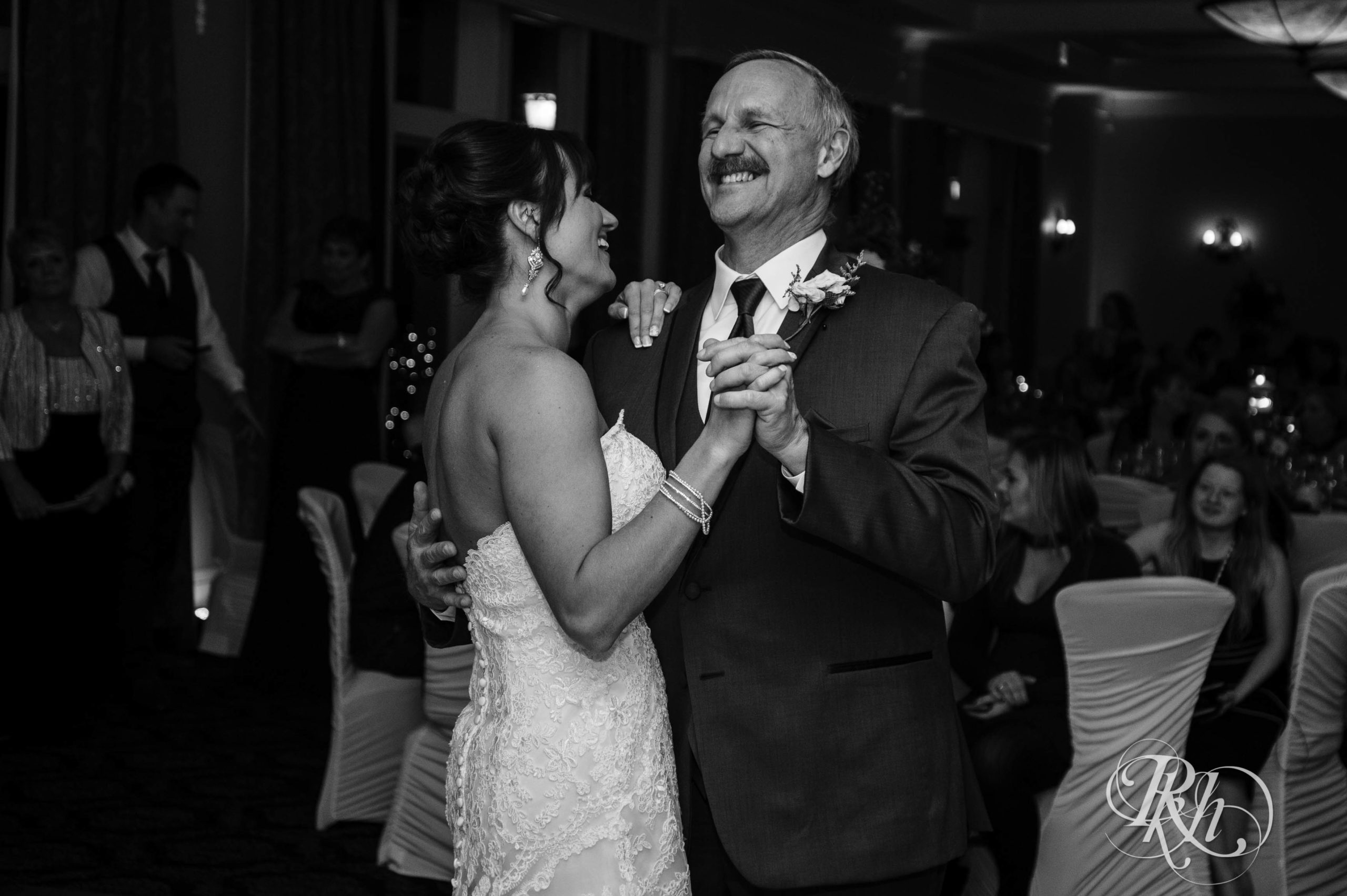 Bride and dad dance on fall wedding day at Minneapolis Golf Club in Minneapolis, Minnesota.