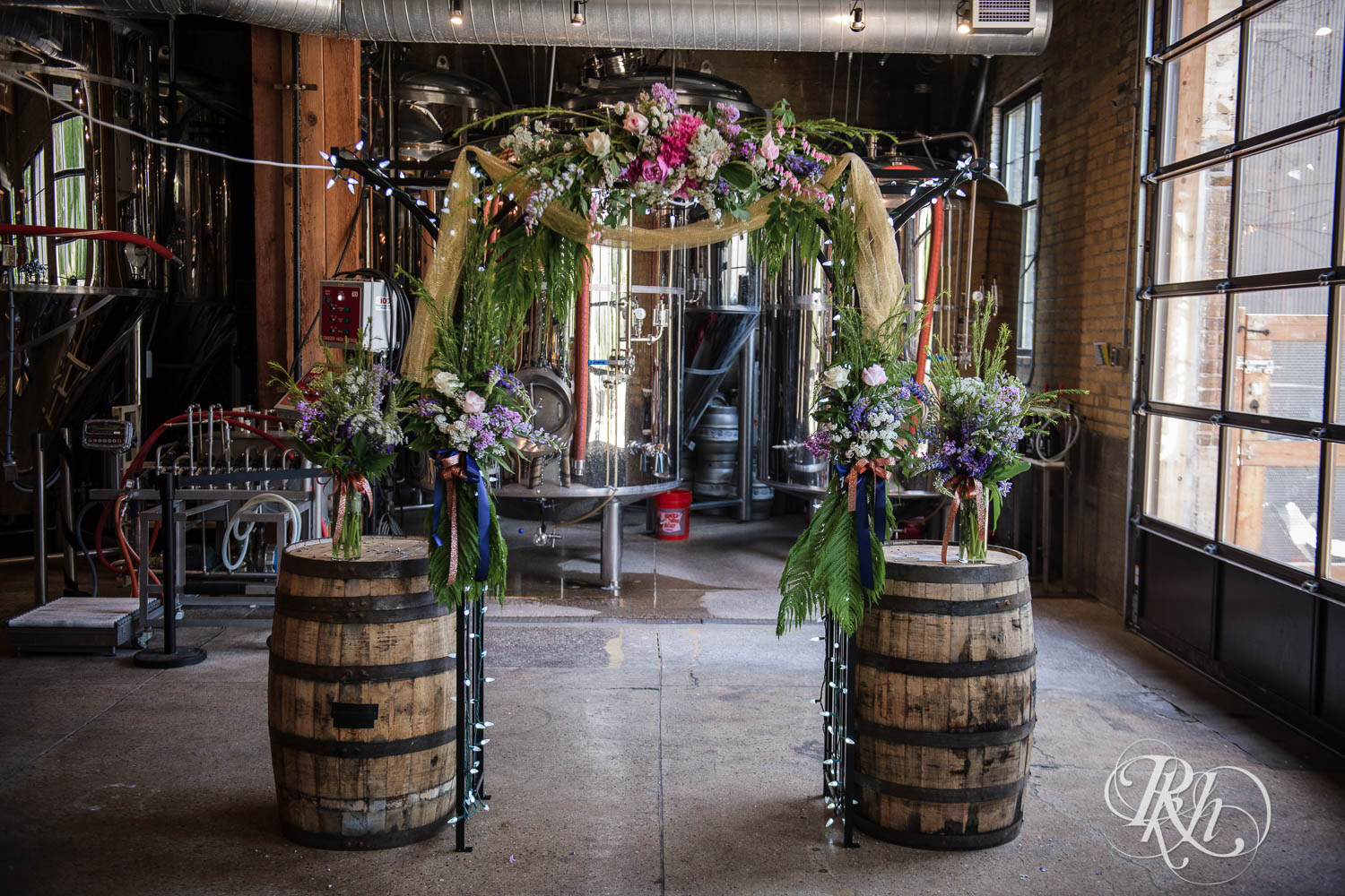 Wedding arch with flowers in 612 Brew in Minneapolis, Minnesota.