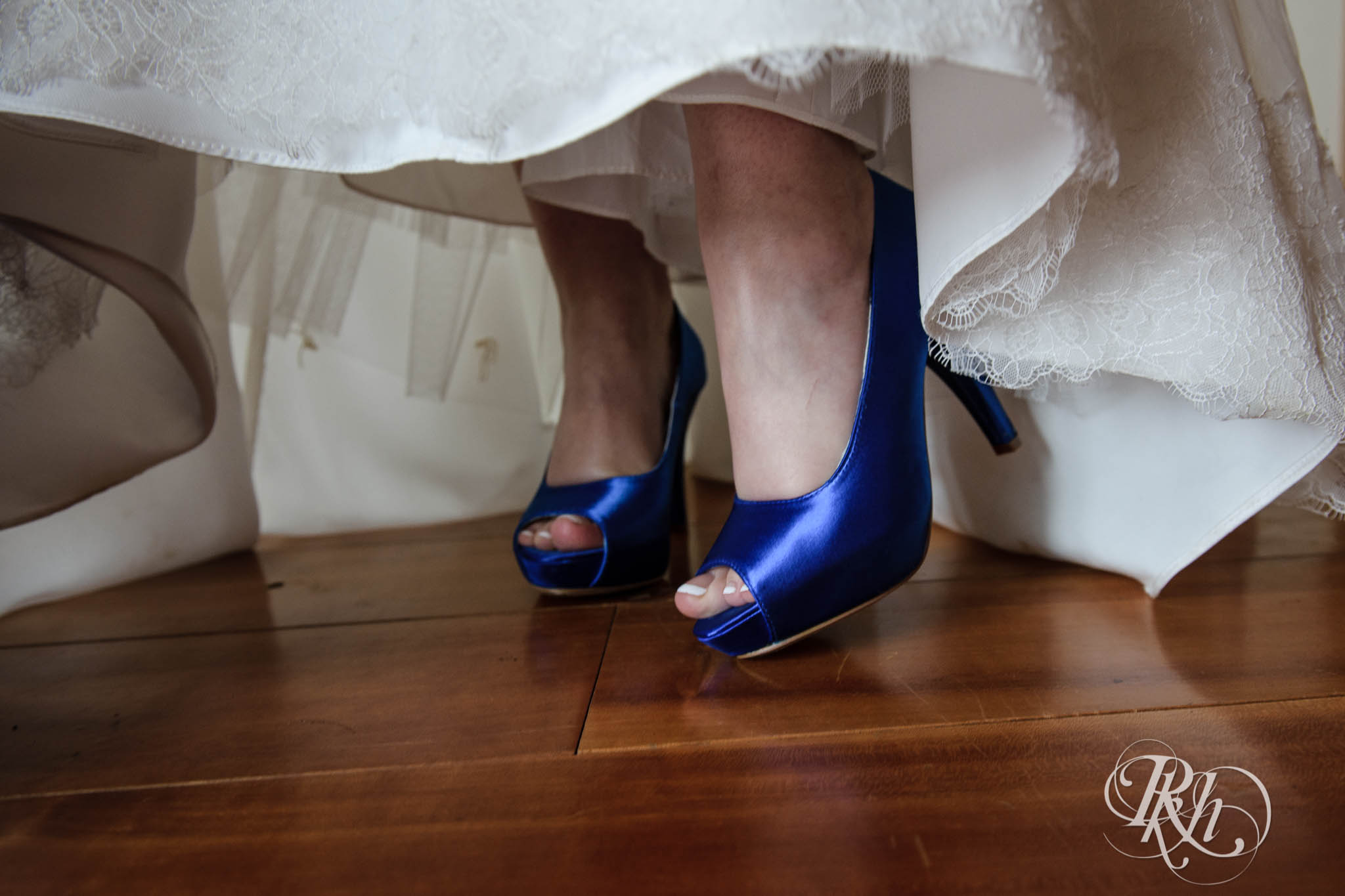 Wedding blue shoes on bride.