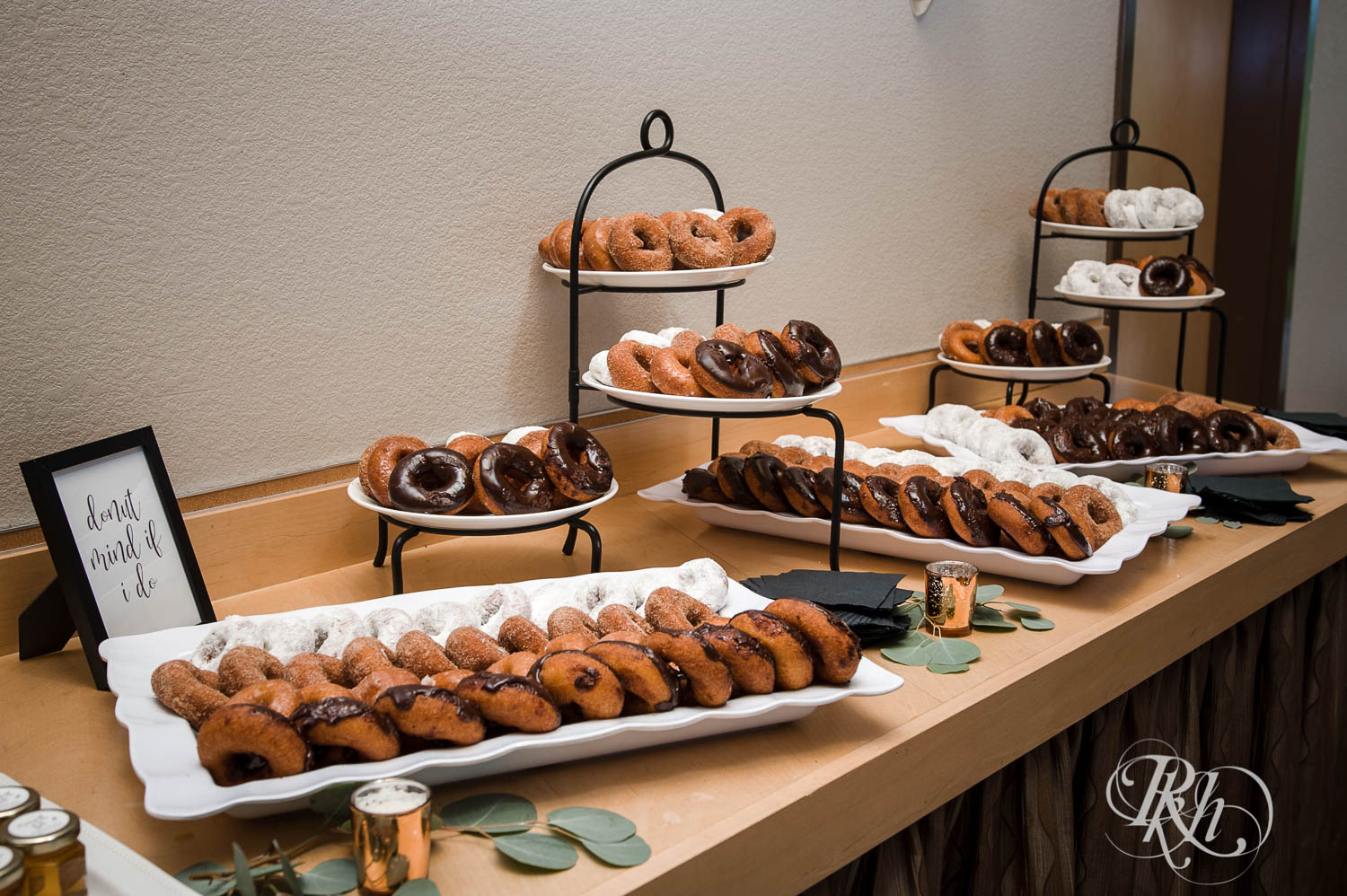 Donut table in wedding reception space at a Bluefin Bay wedding in Tofte, Minnesota.