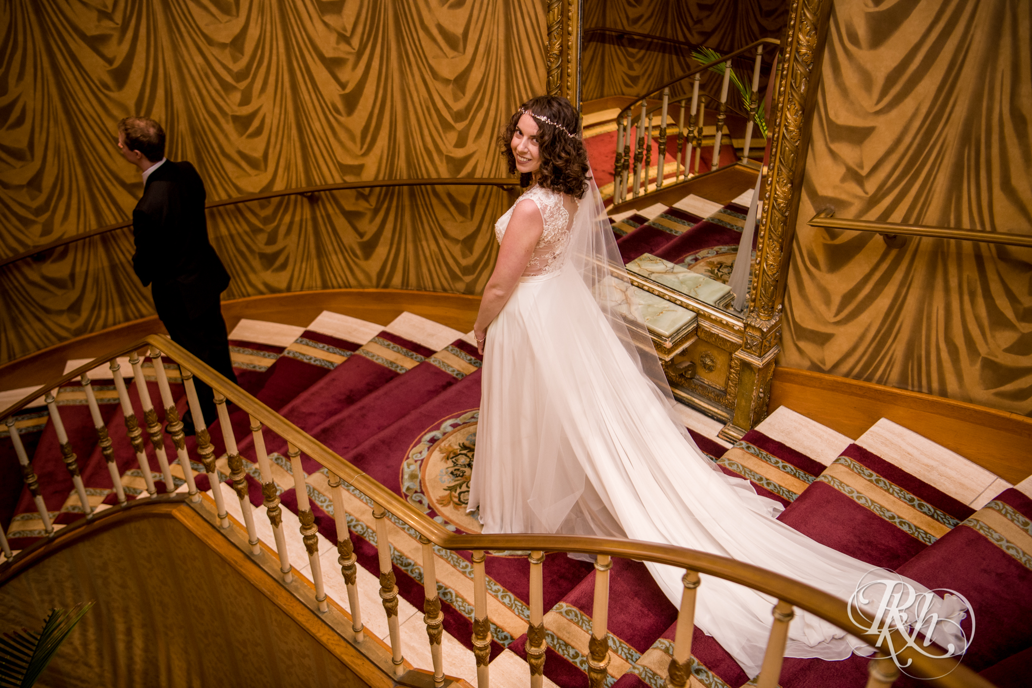 Bride and groom doing first look on staircase at the Saint Paul Hotel in Saint Paul, Minnesota.
