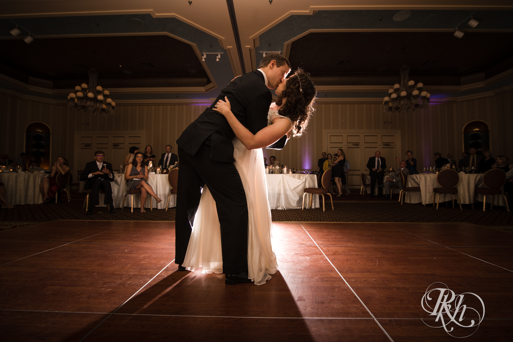 Bride and groom dance during wedding reception at the Saint Paul Hotel in Saint Paul, Minnesota.