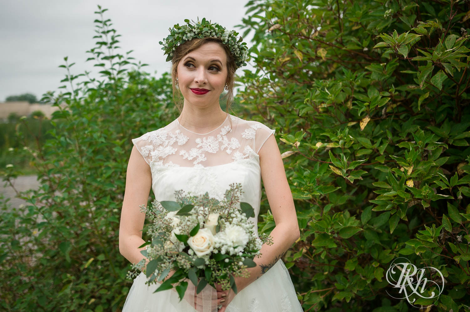 Bride smiles at Plymouth Creek Center wedding in Plymouth, Minnesota.