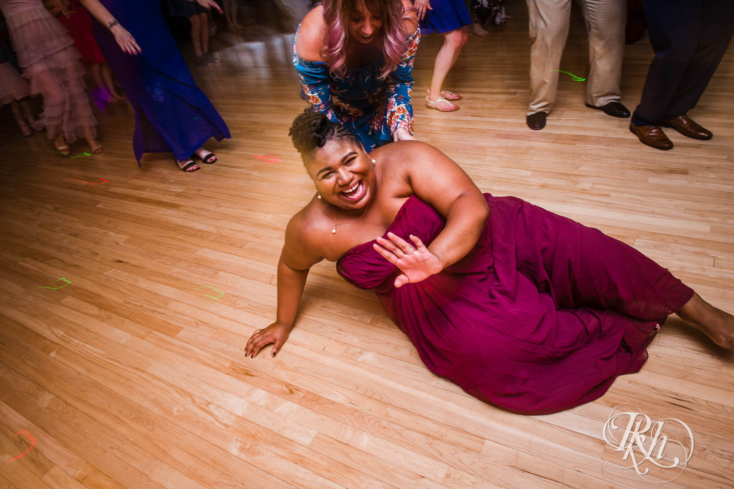 Guests dance during wedding reception at Plymouth Creek Center in Plymouth, Minnesota.