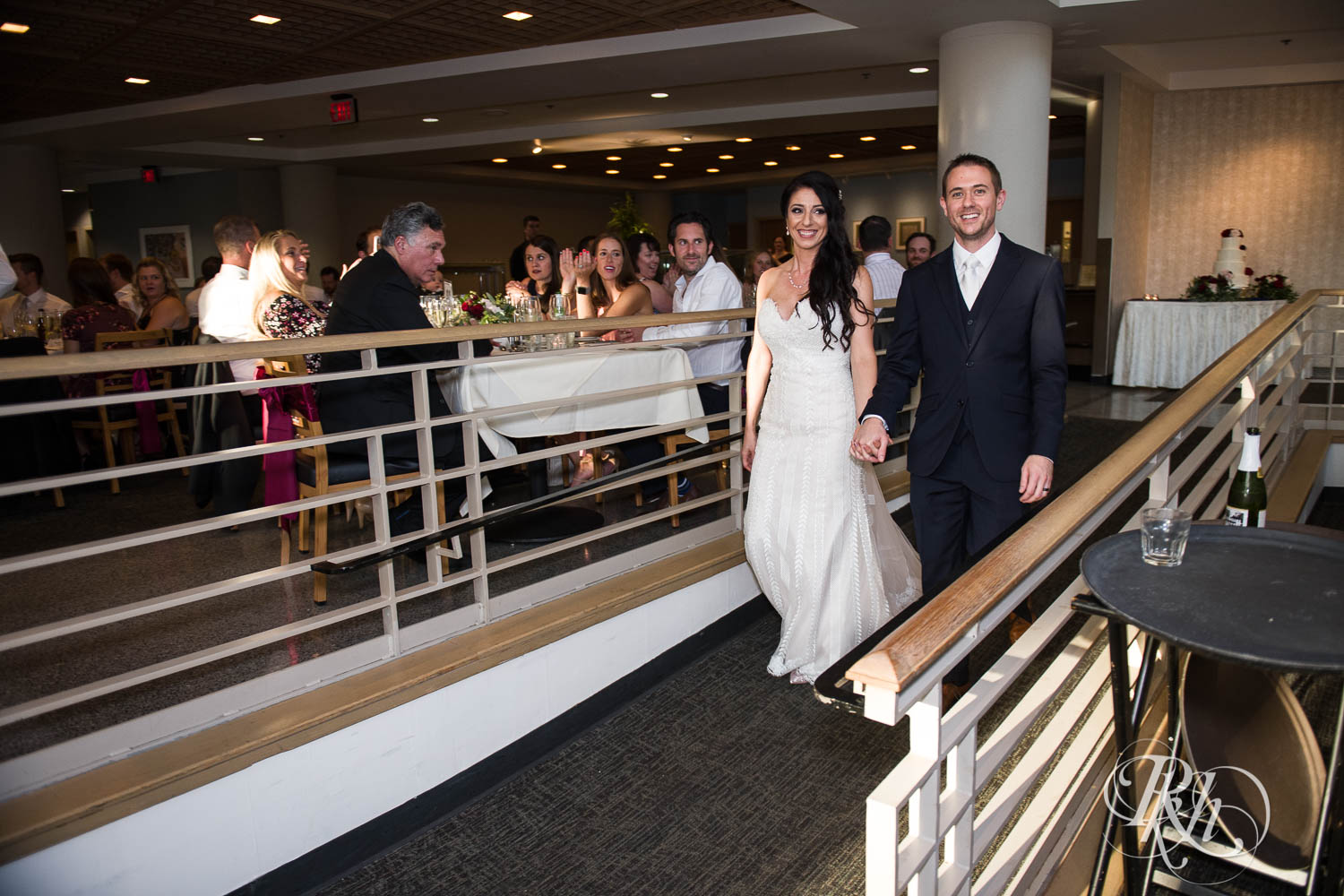 Bride and groom enter wedding reception in Chaska, Minnesota.