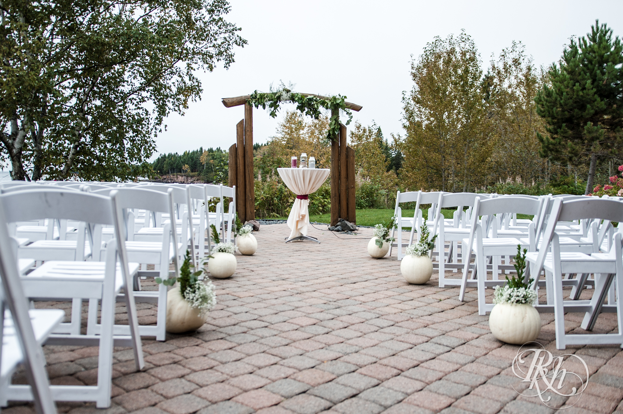 Outdoor fall wedding ceremony setup at Grand Superior Lodge in Two Harbors, Minnesota.