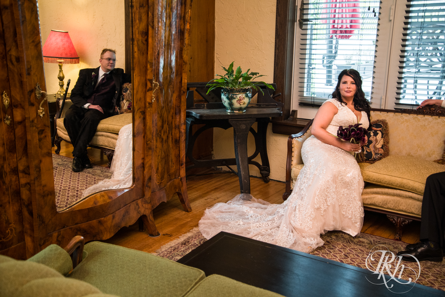 Bride and groom smile at Kellerman's Event Center in White Bear Lake, Minnesota.