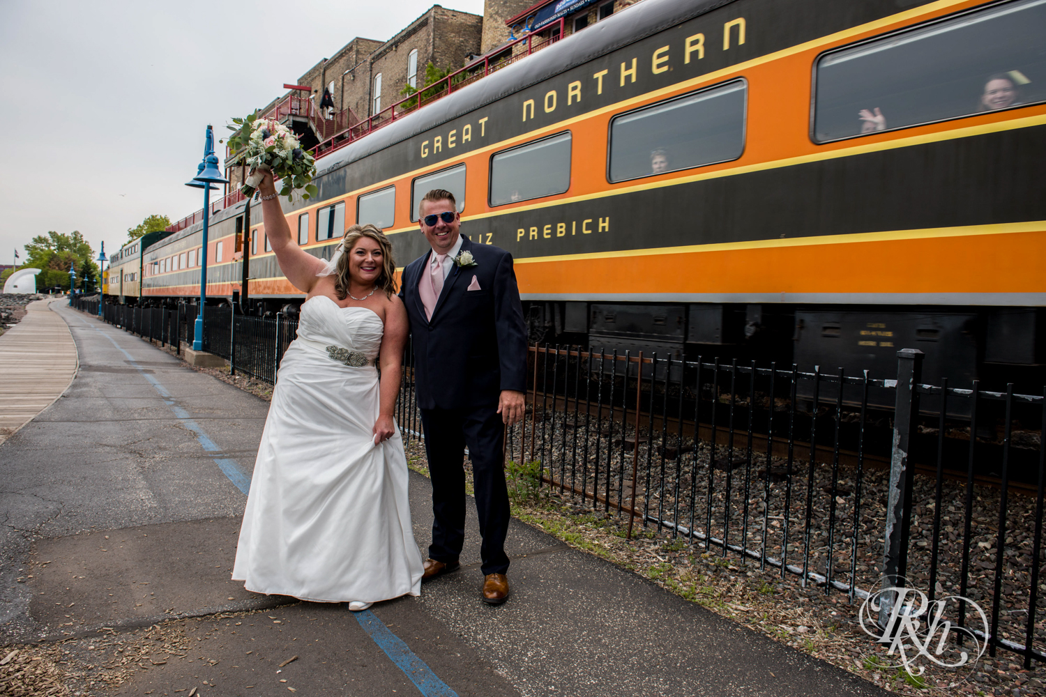 Train behind bride and groom