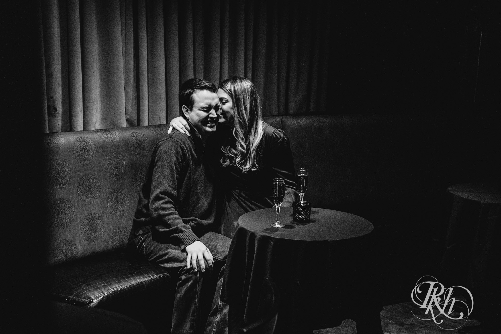 Man and woman laugh at Honey Lounge in Minneapolis, Minnesota.
