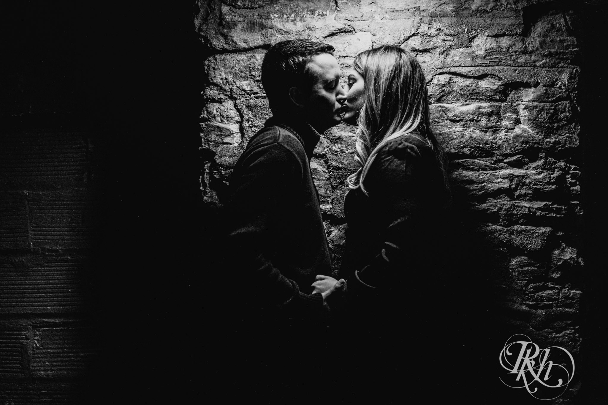 Man and woman kiss at Honey Lounge in Minneapolis, Minnesota.