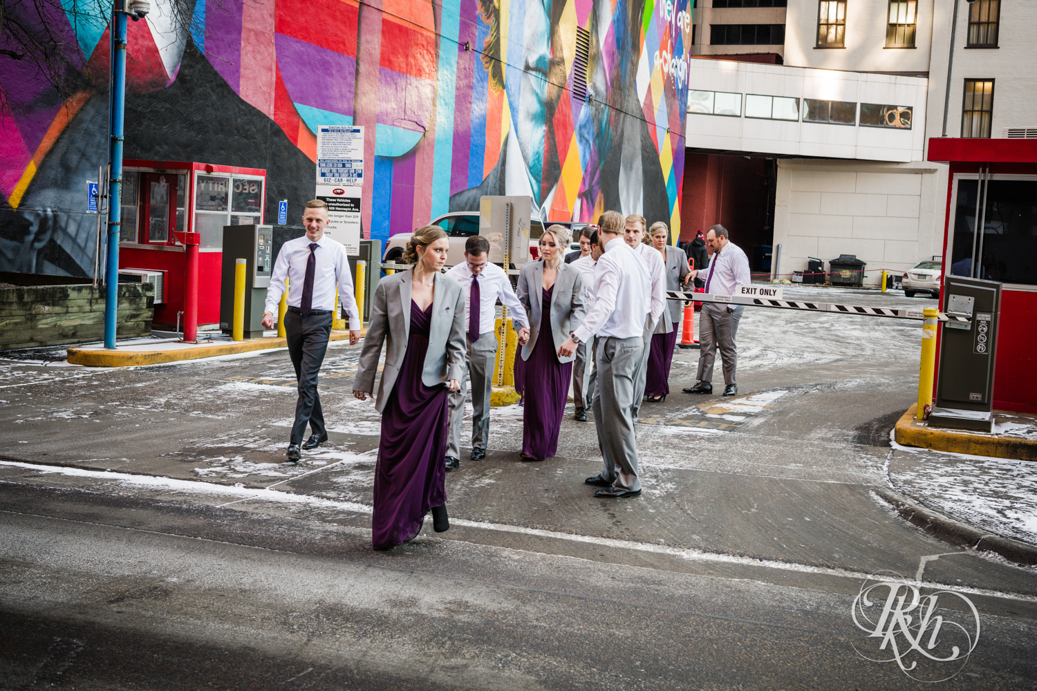 Wedding party walks across the street in Minneapolis, Minnesota.